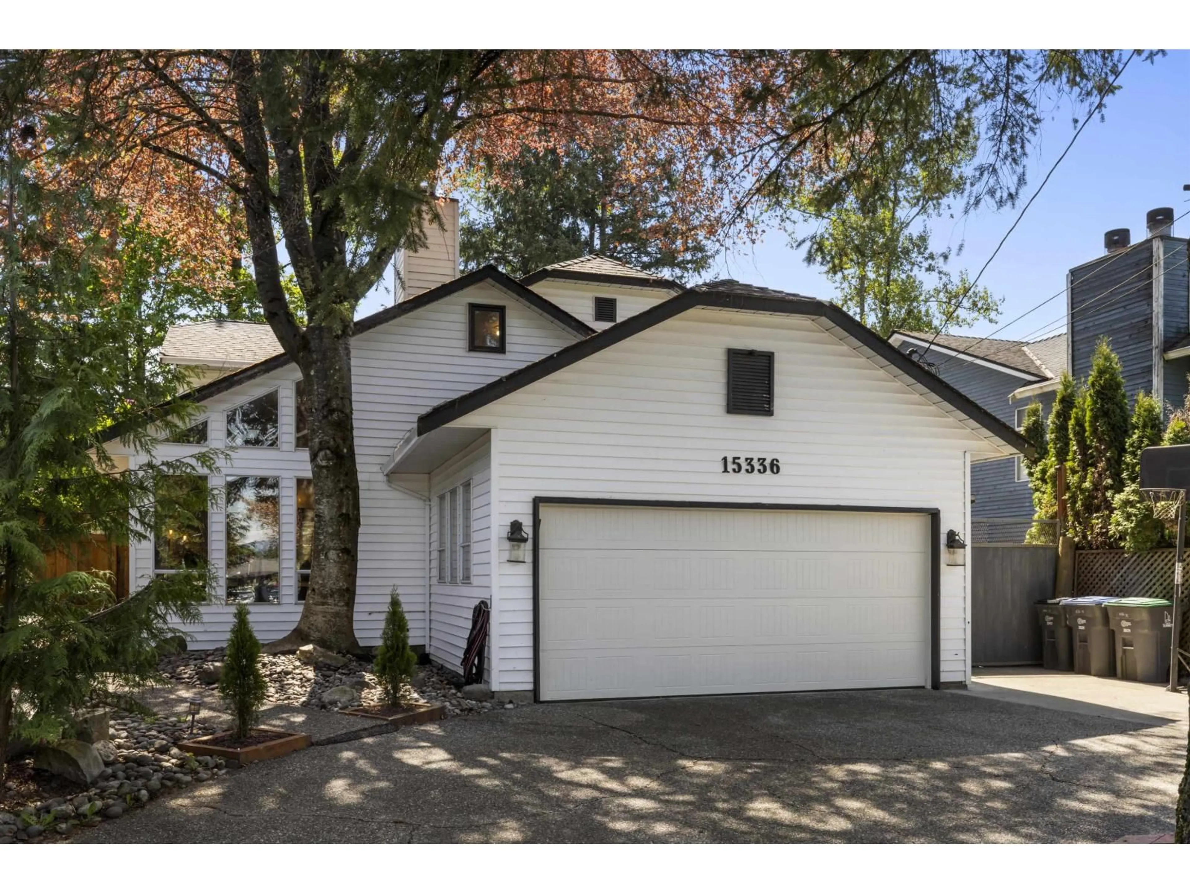 Home with vinyl exterior material, street for 15336 112 AVENUE, Surrey British Columbia V3R8Y8