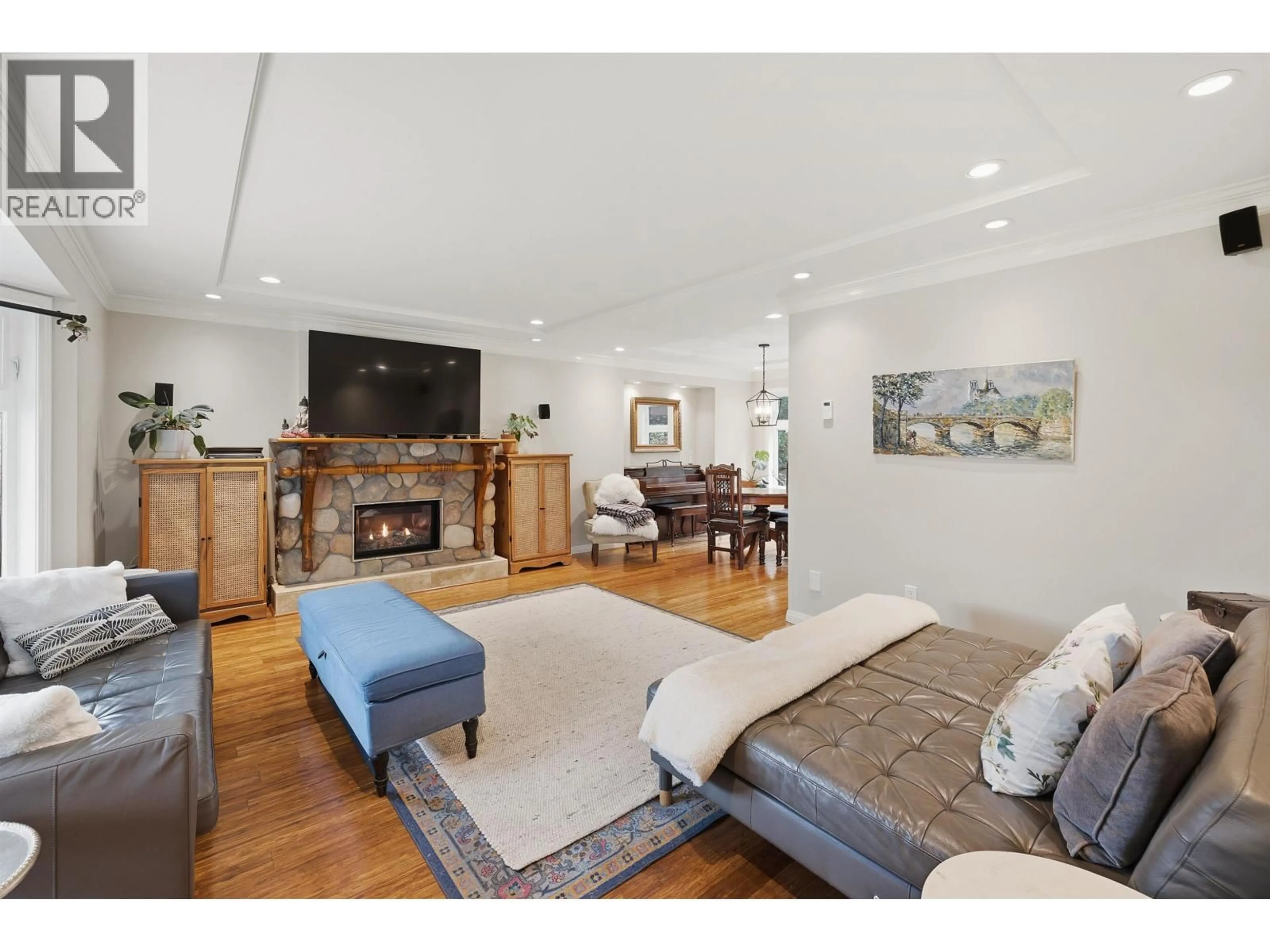 Living room with furniture, wood/laminate floor for 4554 48B STREET, Ladner British Columbia V4K2R8