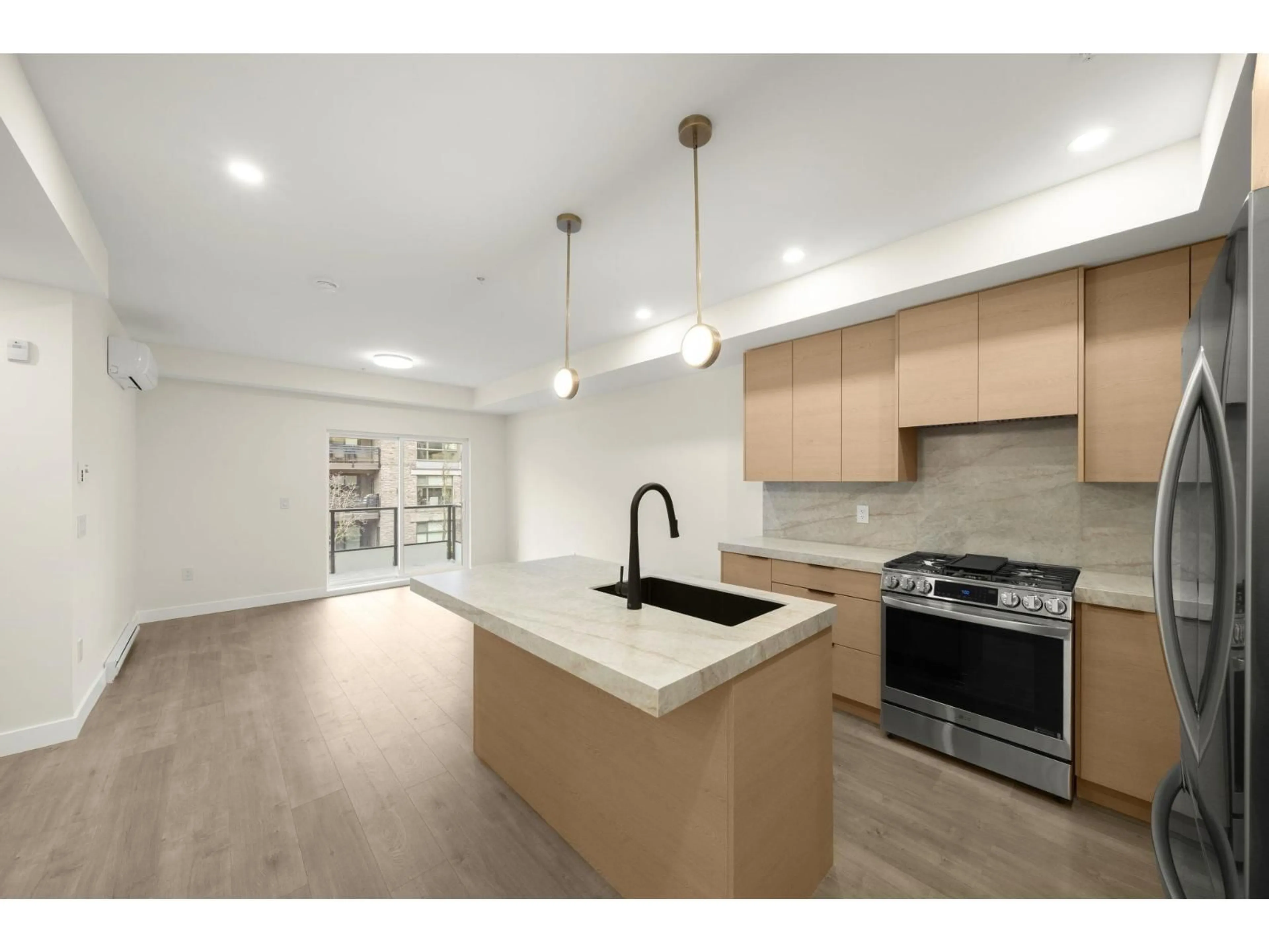 Open concept kitchen, unknown for 211 - 15353 17 AVENUE, Surrey British Columbia V4A1T8