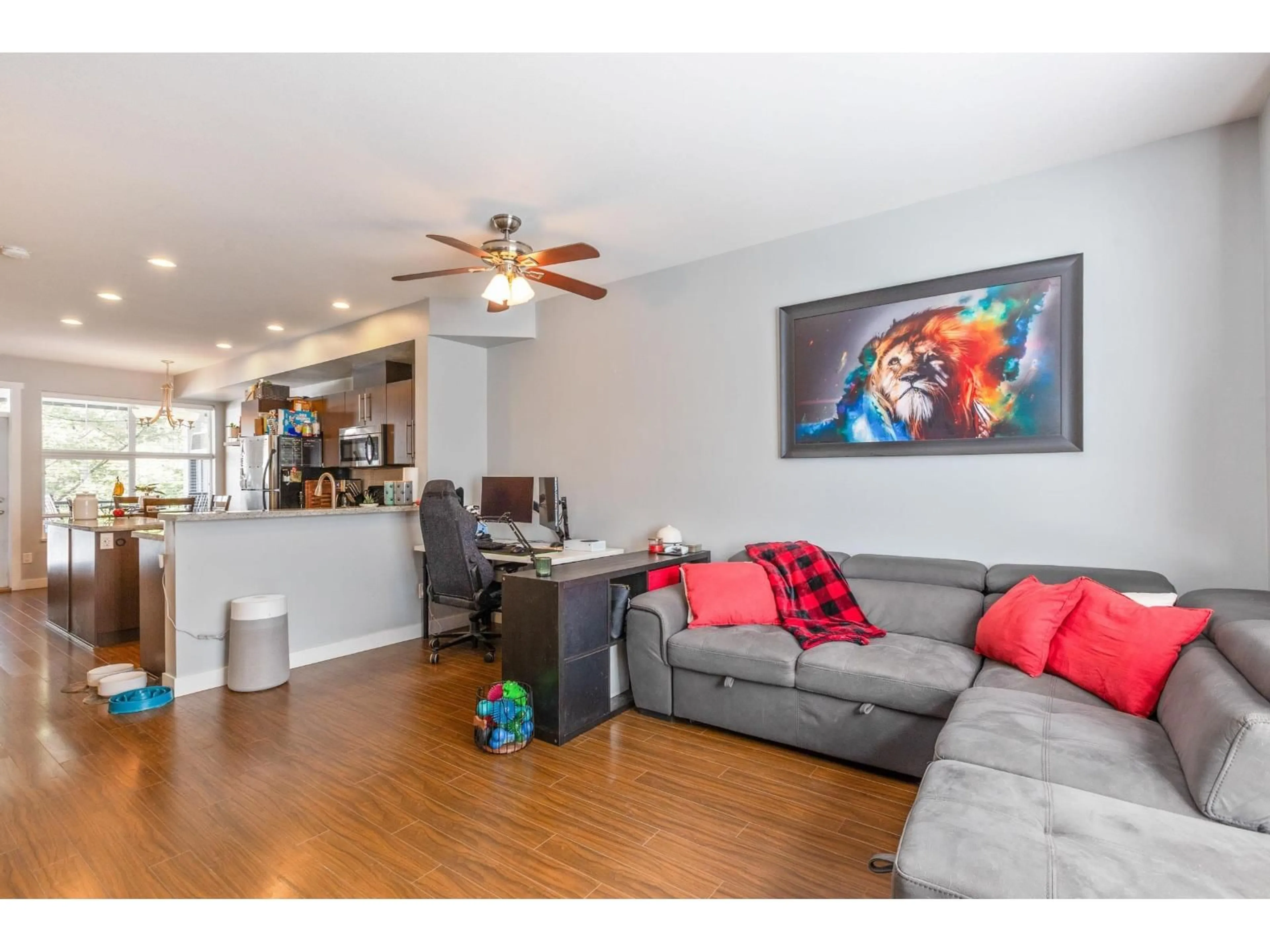 Living room with furniture, wood/laminate floor for 19 - 18211 70 AVENUE, Surrey British Columbia V3S8K9