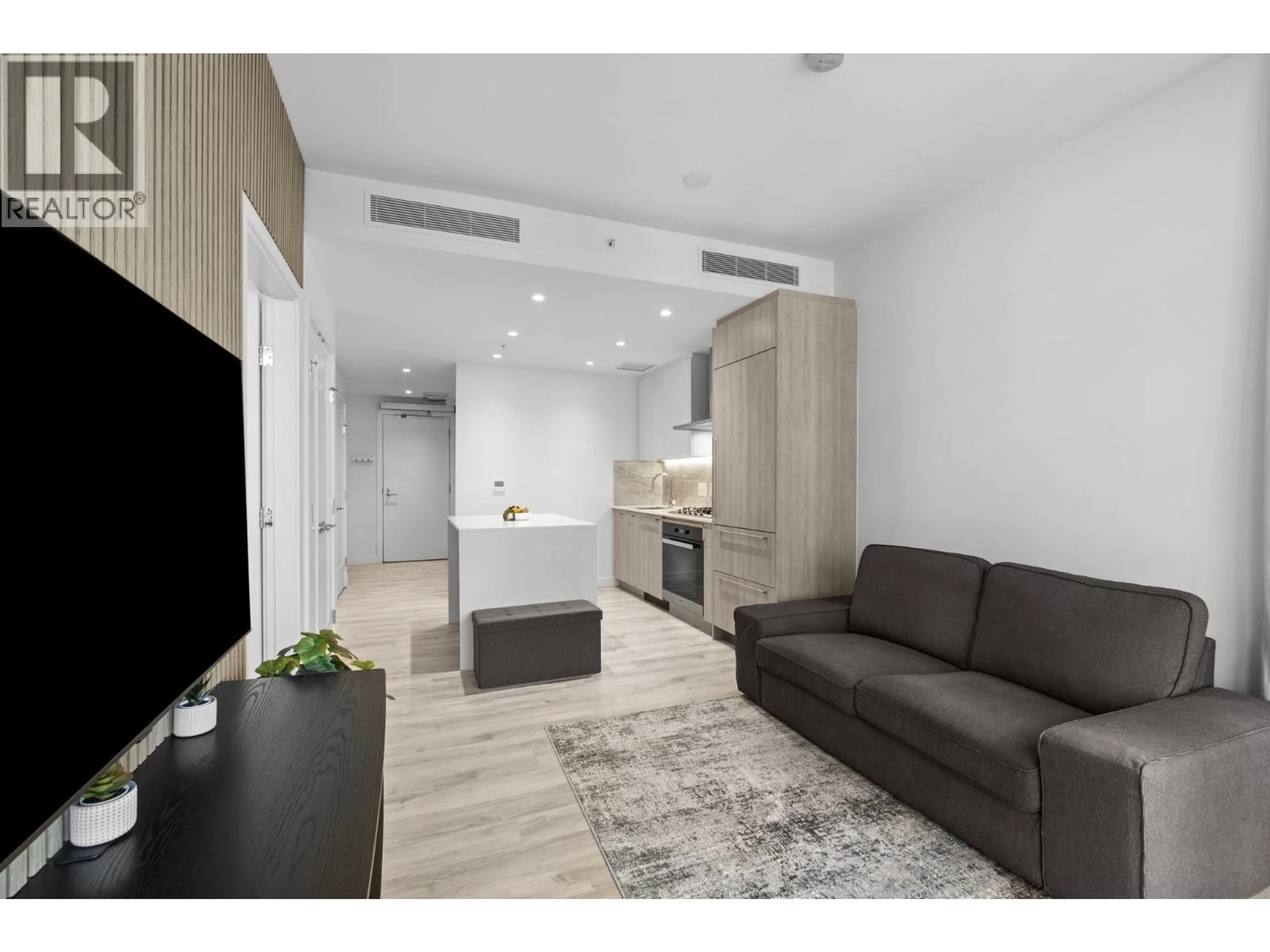 Living room with furniture, wood/laminate floor for 1602 - 2288 ALPHA AVENUE, Burnaby British Columbia V5C0L9