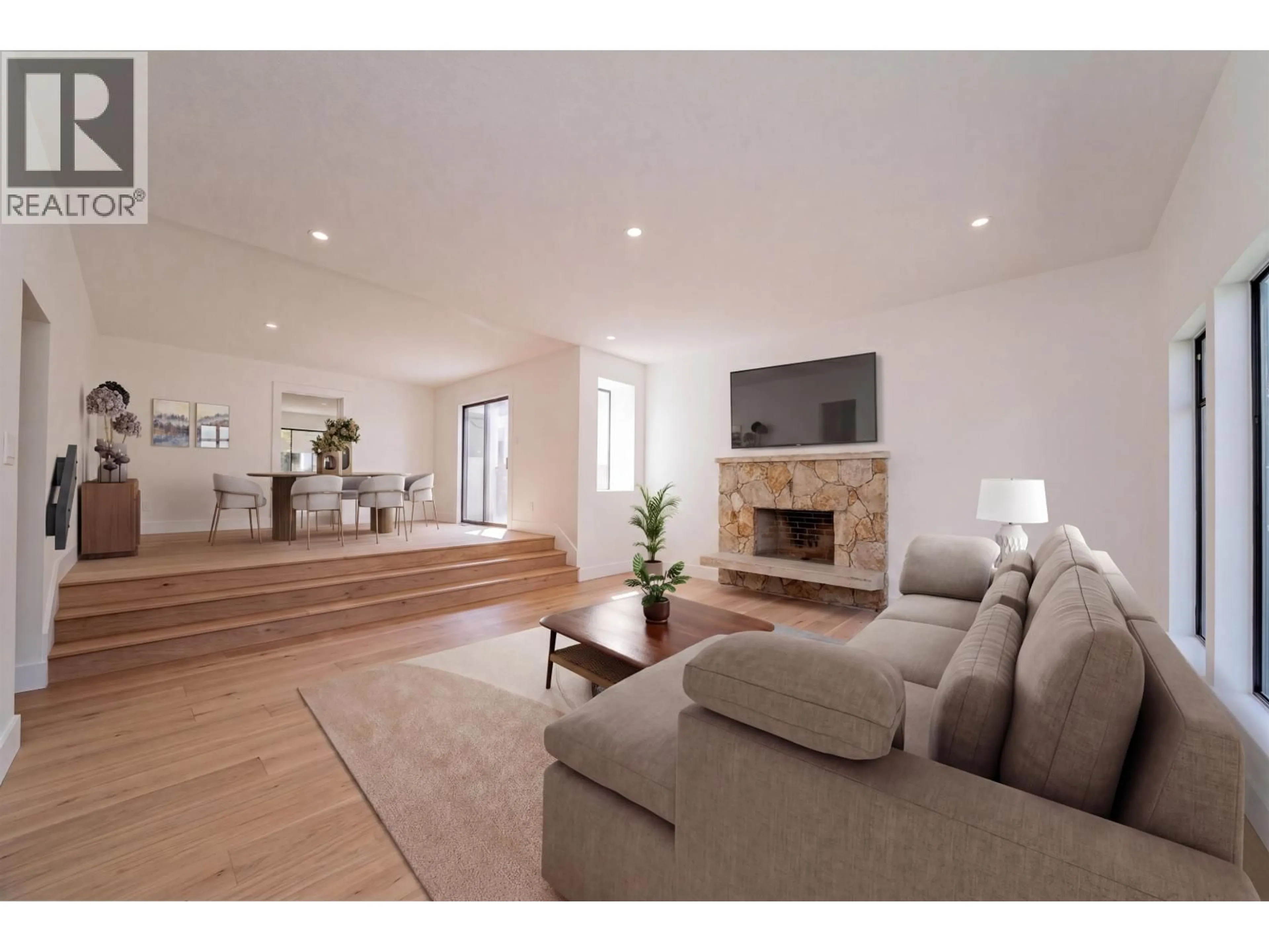 Living room with furniture, wood/laminate floor for 3974 10TH AVENUE, Vancouver British Columbia V6R2G8