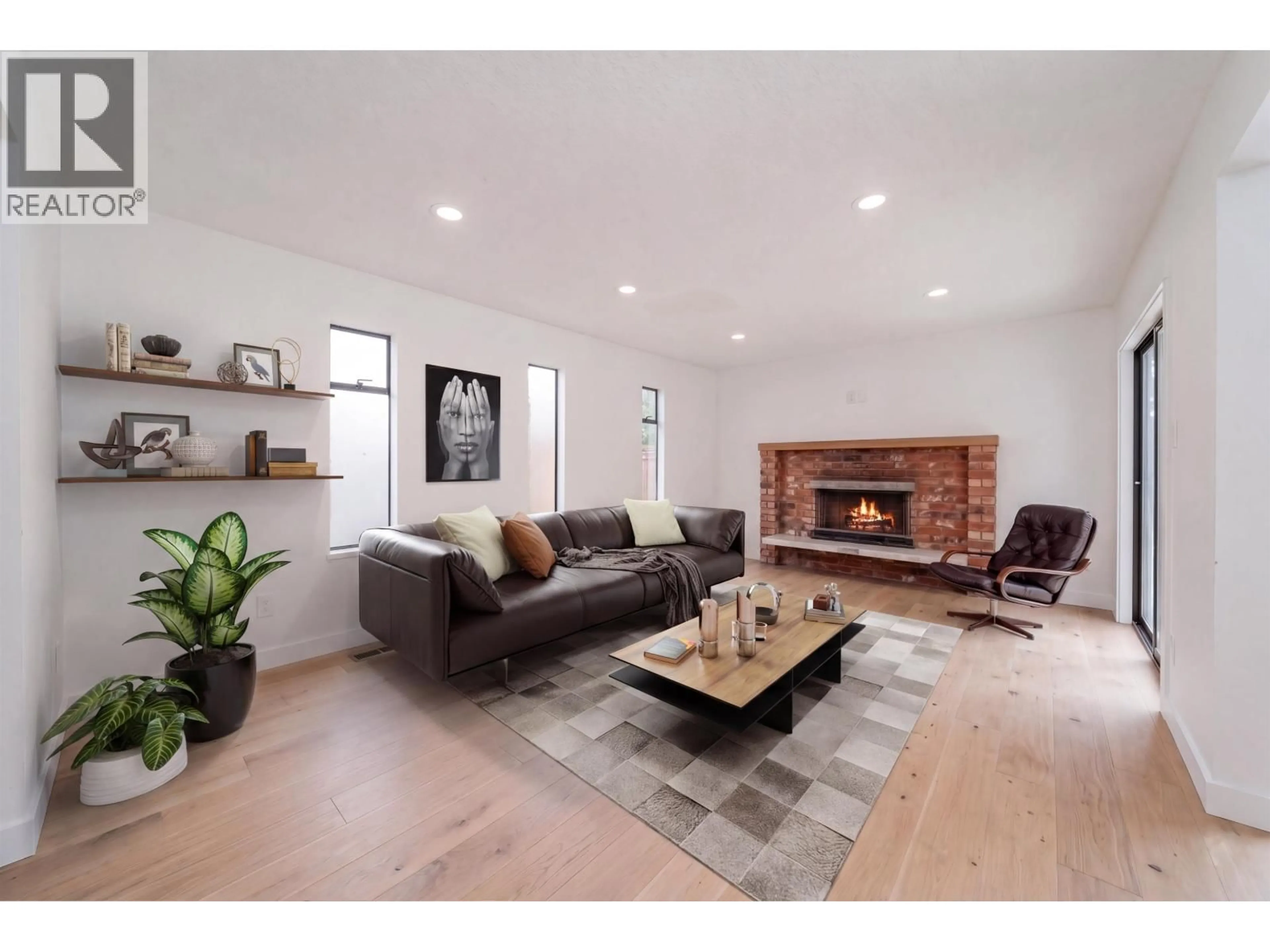 Living room with furniture, wood/laminate floor for 3974 10TH AVENUE, Vancouver British Columbia V6R2G8