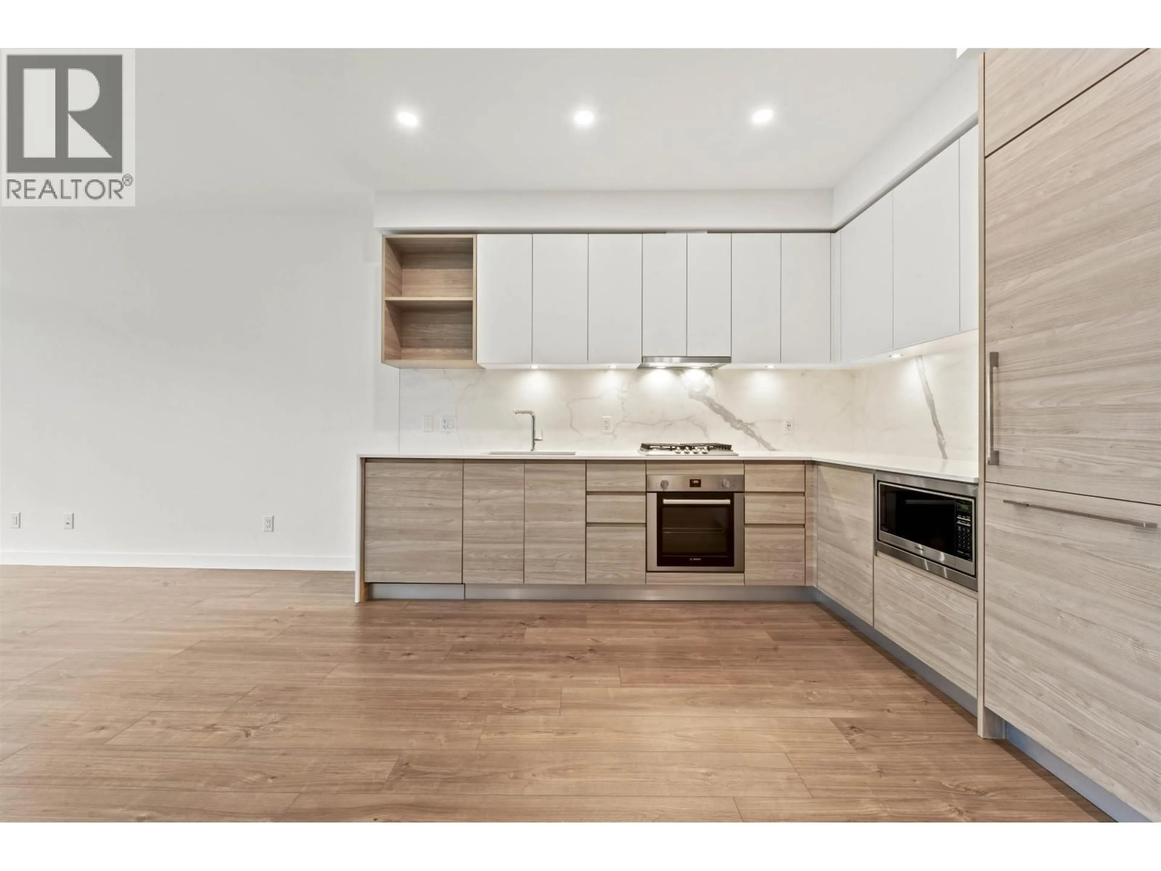 Open concept kitchen, wood/laminate floor for 502 - 585 AUSTIN AVENUE, Coquitlam British Columbia V3K0G6