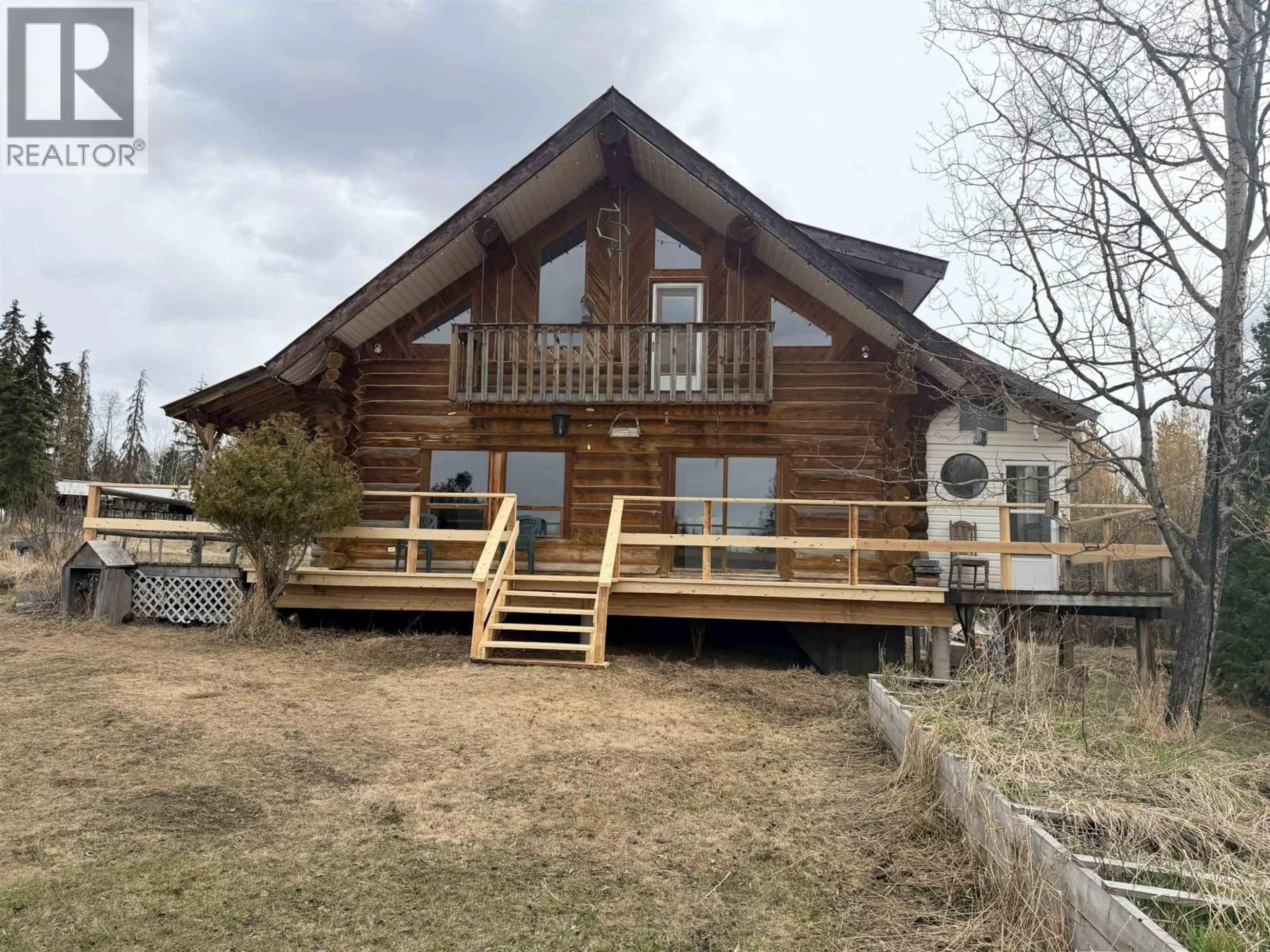 A pic from outside/outdoor area/front of a property/back of a property/a pic from drone, building for 3642 SPOKIN LAKE ROAD, 150 Mile House British Columbia V0K2G0