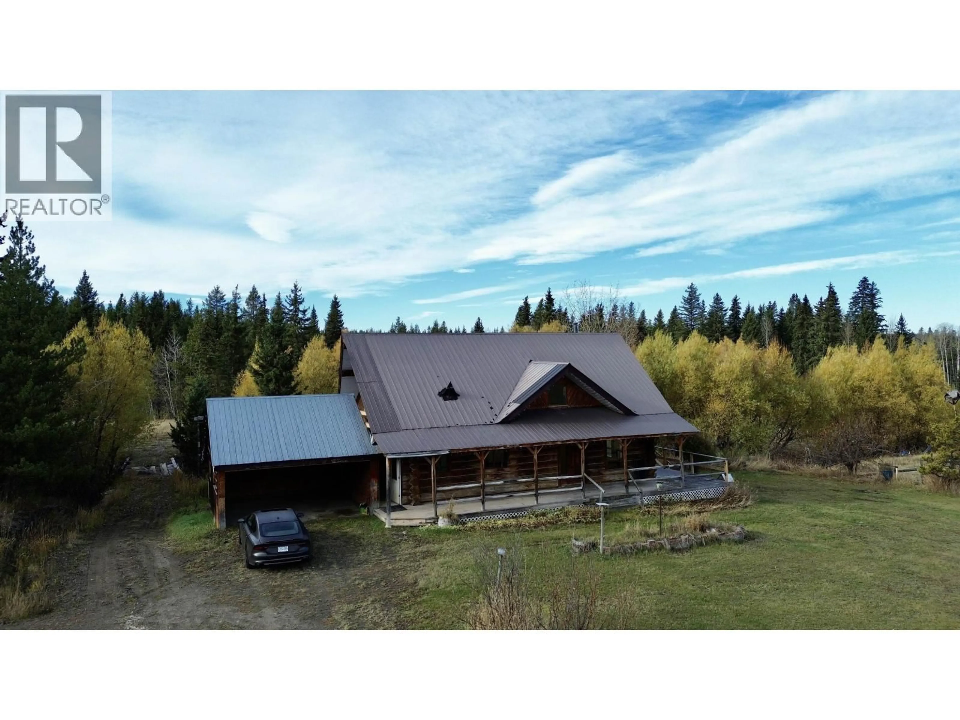 A pic from outside/outdoor area/front of a property/back of a property/a pic from drone, building for 3642 SPOKIN LAKE ROAD, 150 Mile House British Columbia V0K2G0