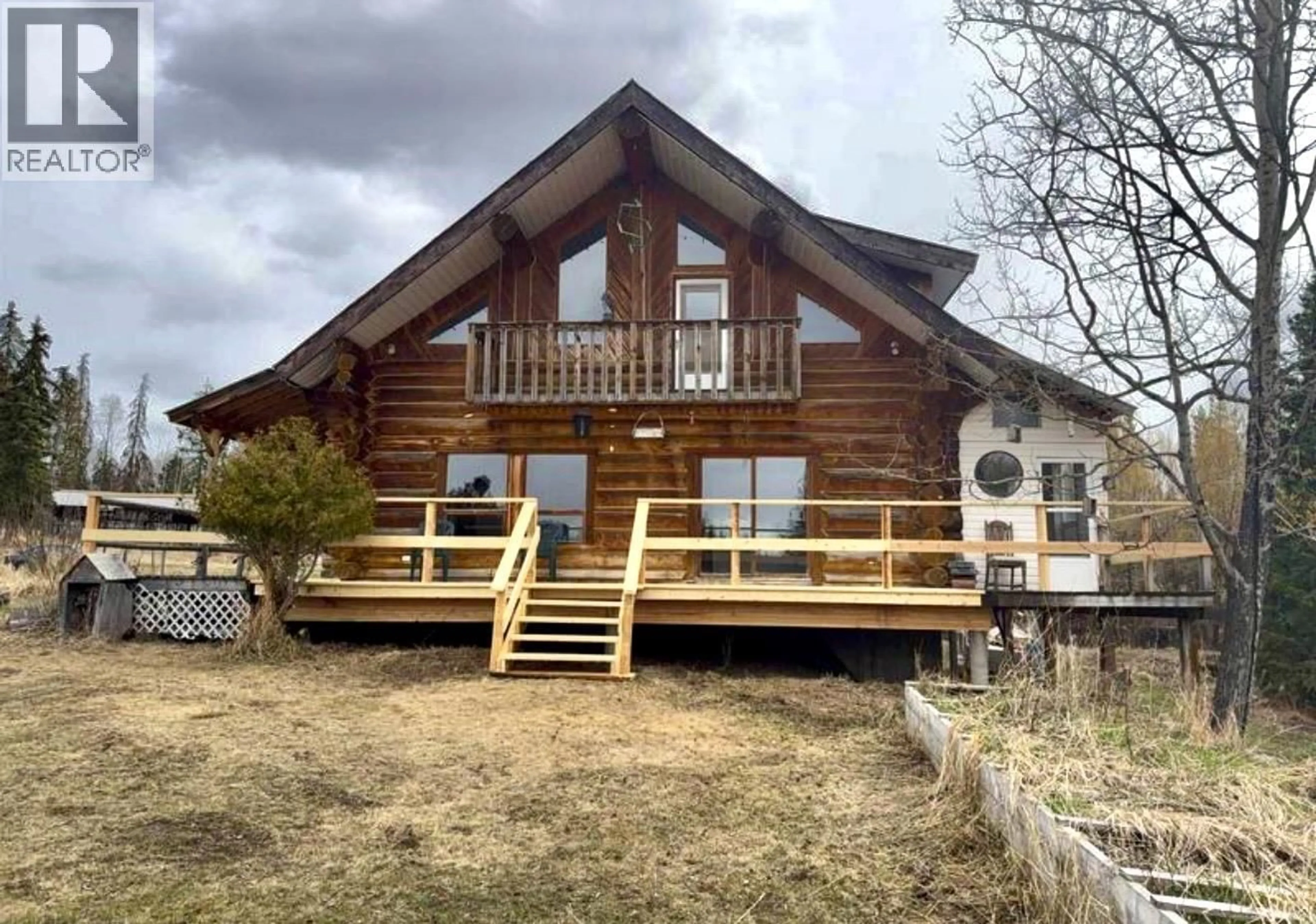 A pic from outside/outdoor area/front of a property/back of a property/a pic from drone, building for 3642 SPOKIN LAKE ROAD, 150 Mile House British Columbia V0K2G0