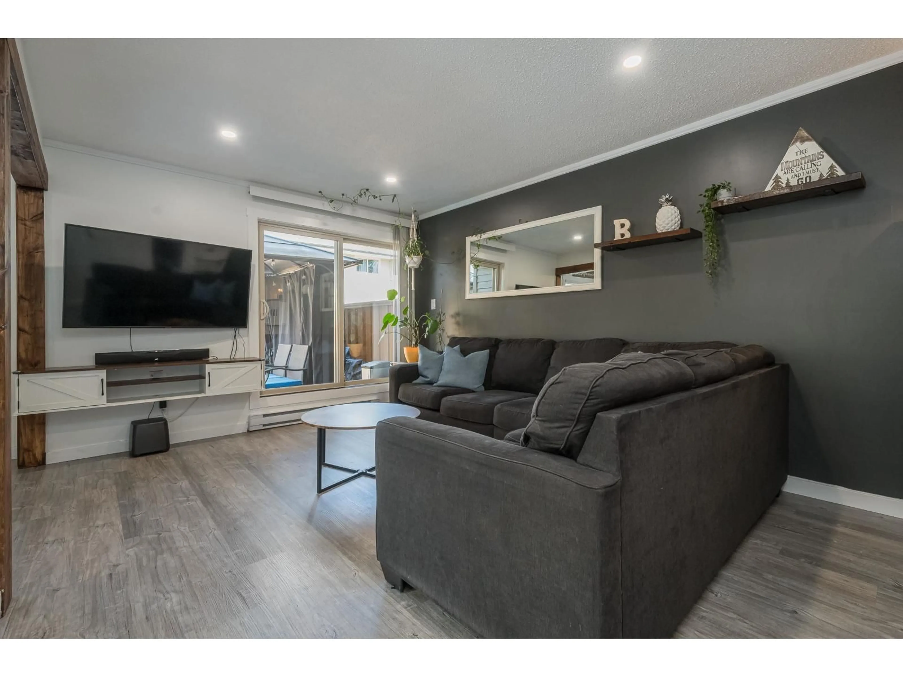 Living room with furniture, wood/laminate floor for 170 - 27456 32 AVENUE, Langley British Columbia V4W3P3