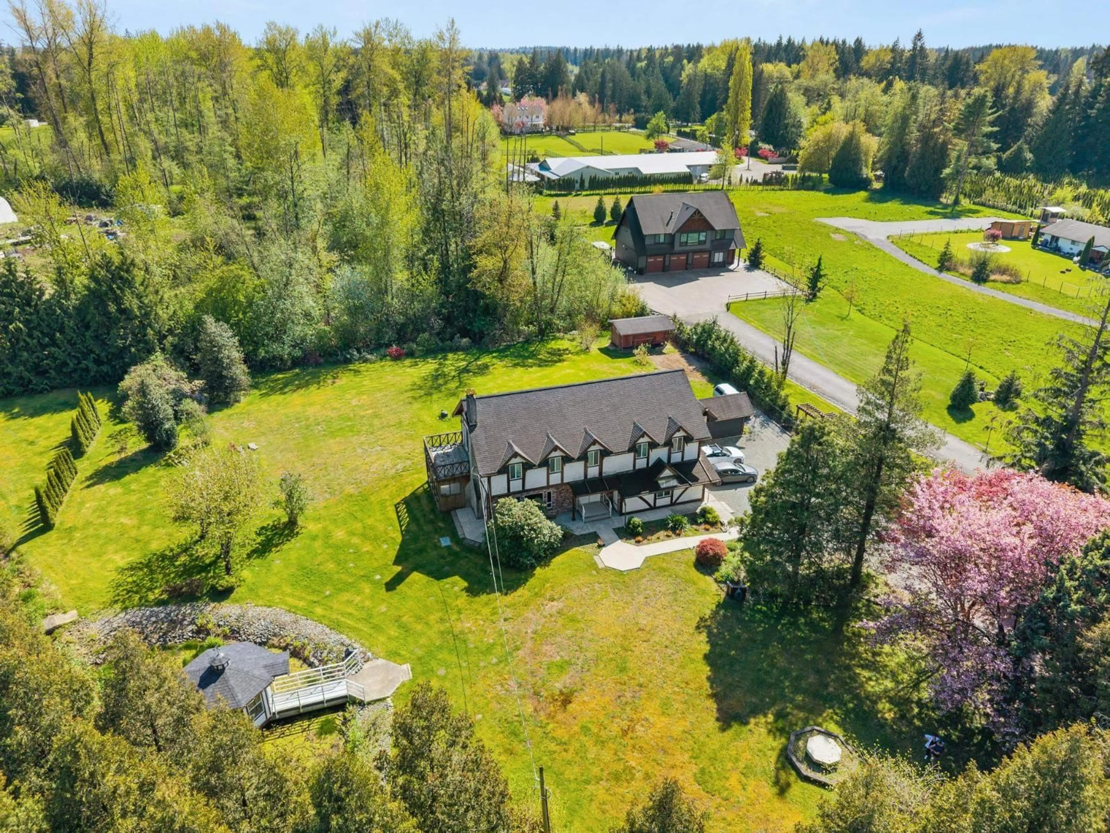 A pic from outside/outdoor area/front of a property/back of a property/a pic from drone, water/lake/river/ocean view for 25474 60 AVENUE, Langley British Columbia V4W1H1
