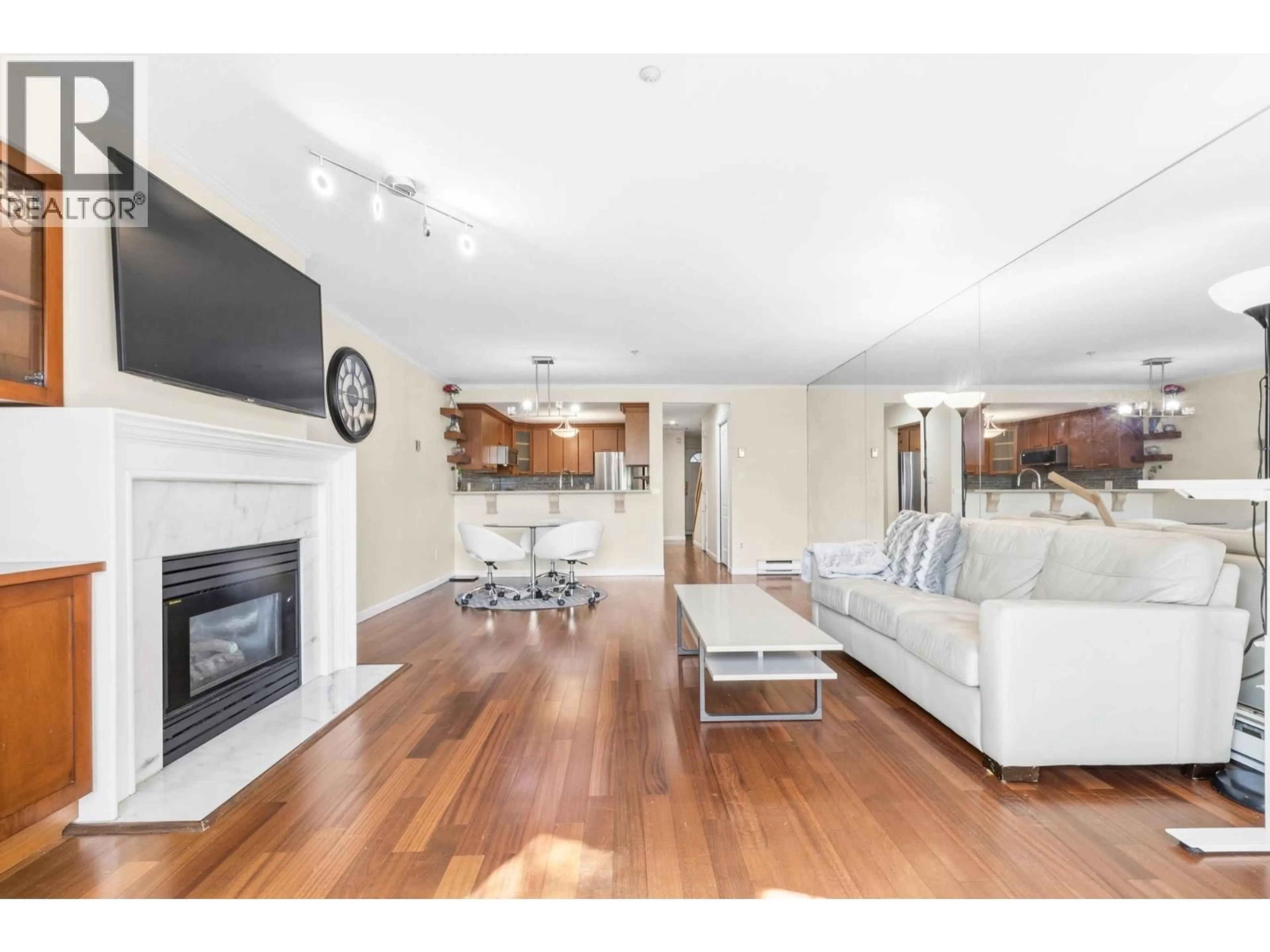 Living room with furniture, wood/laminate floor for 3 - 2150 MARINE DRIVE, Vancouver British Columbia V5P2S1