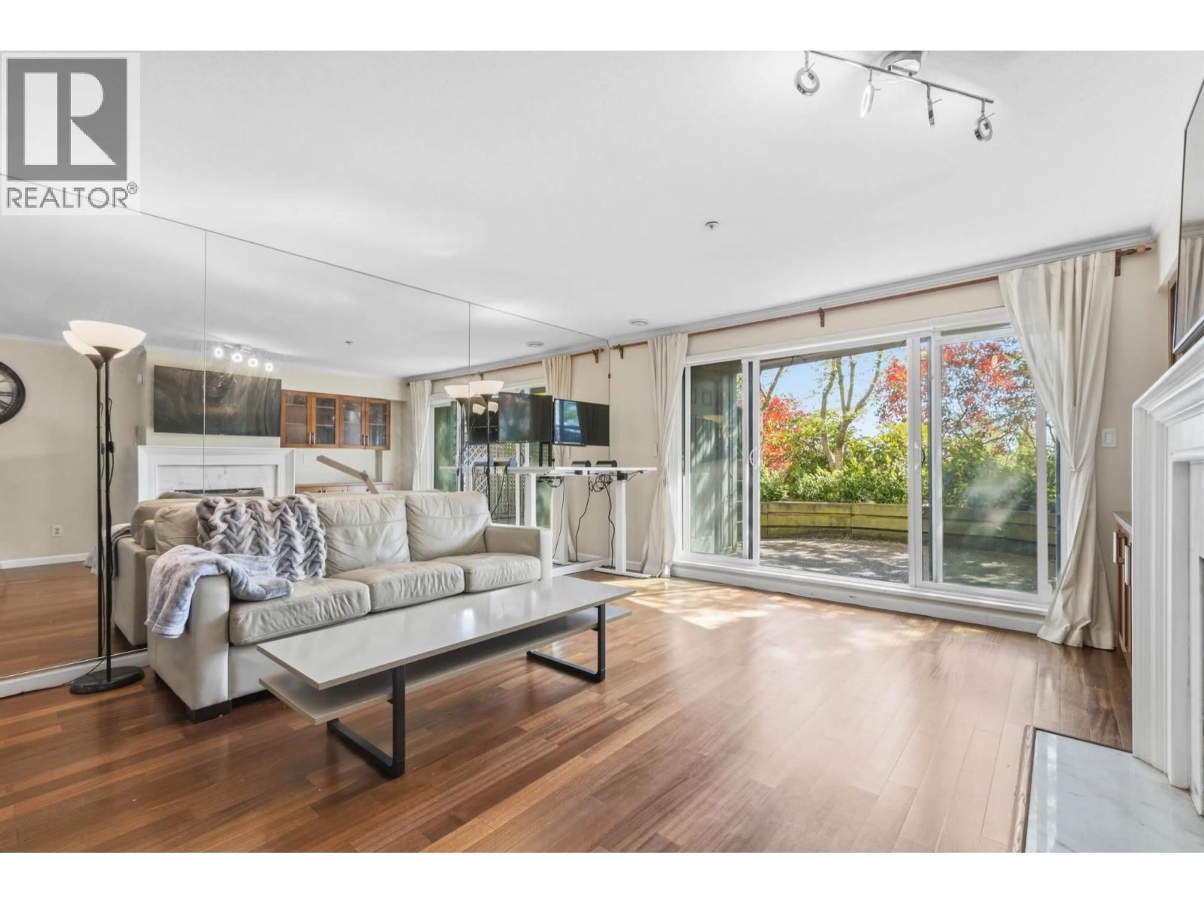 Living room with furniture, wood/laminate floor for 3 - 2150 MARINE DRIVE, Vancouver British Columbia V5P2S1