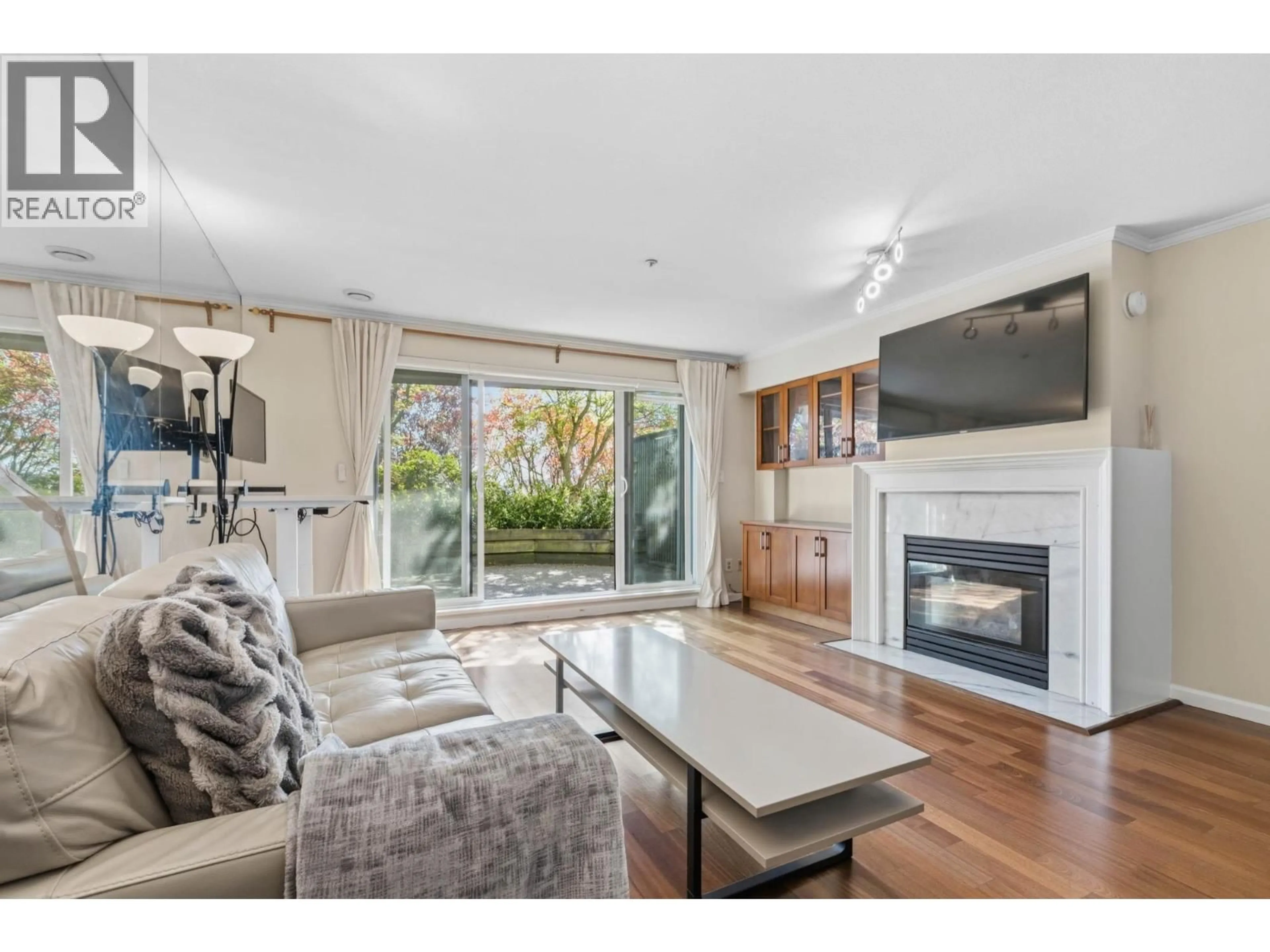 Living room with furniture, wood/laminate floor for 3 - 2150 MARINE DRIVE, Vancouver British Columbia V5P2S1