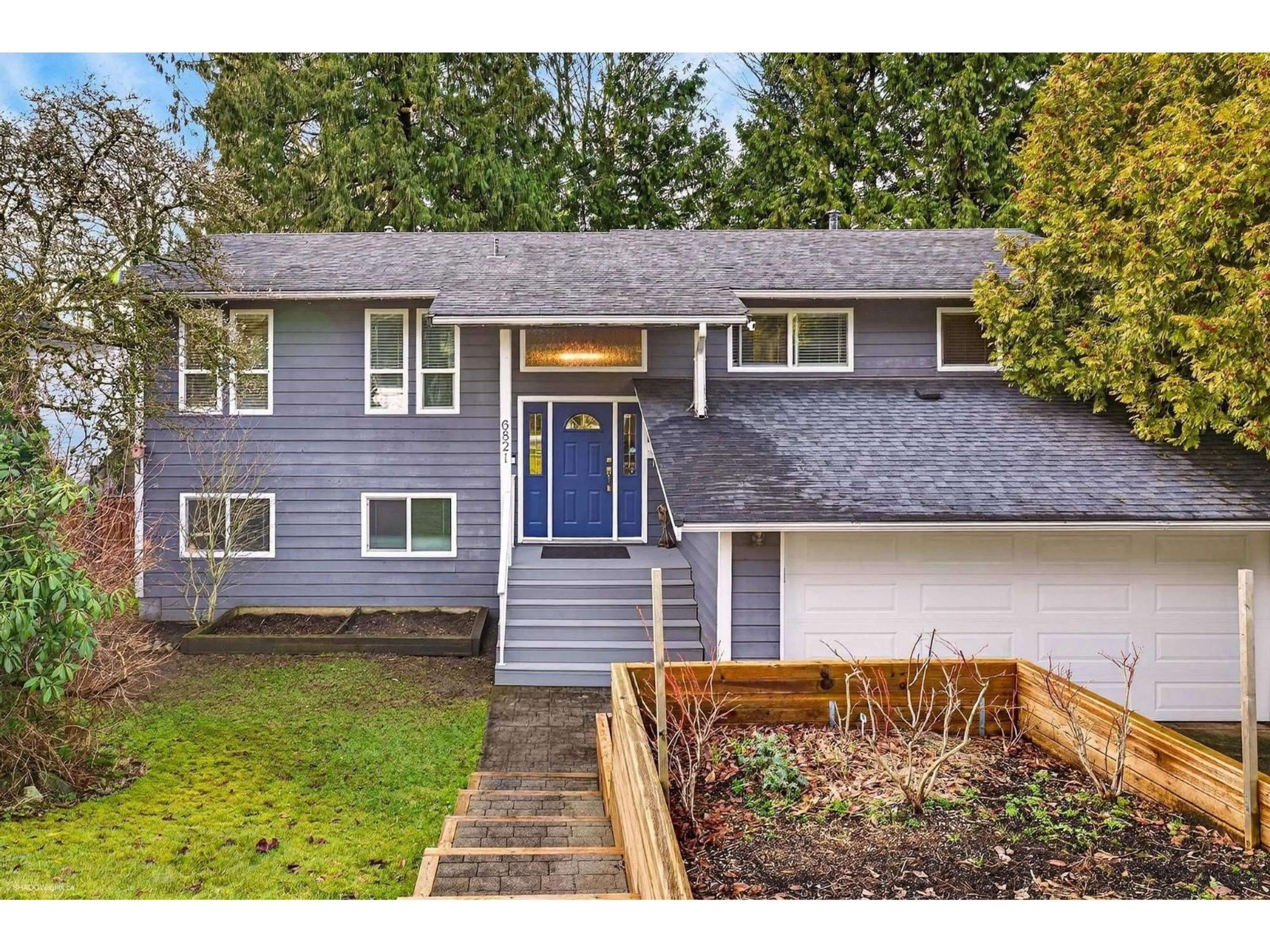 Home with vinyl exterior material, street for 6821 WESTVIEW DRIVE, Delta British Columbia V4E2L7