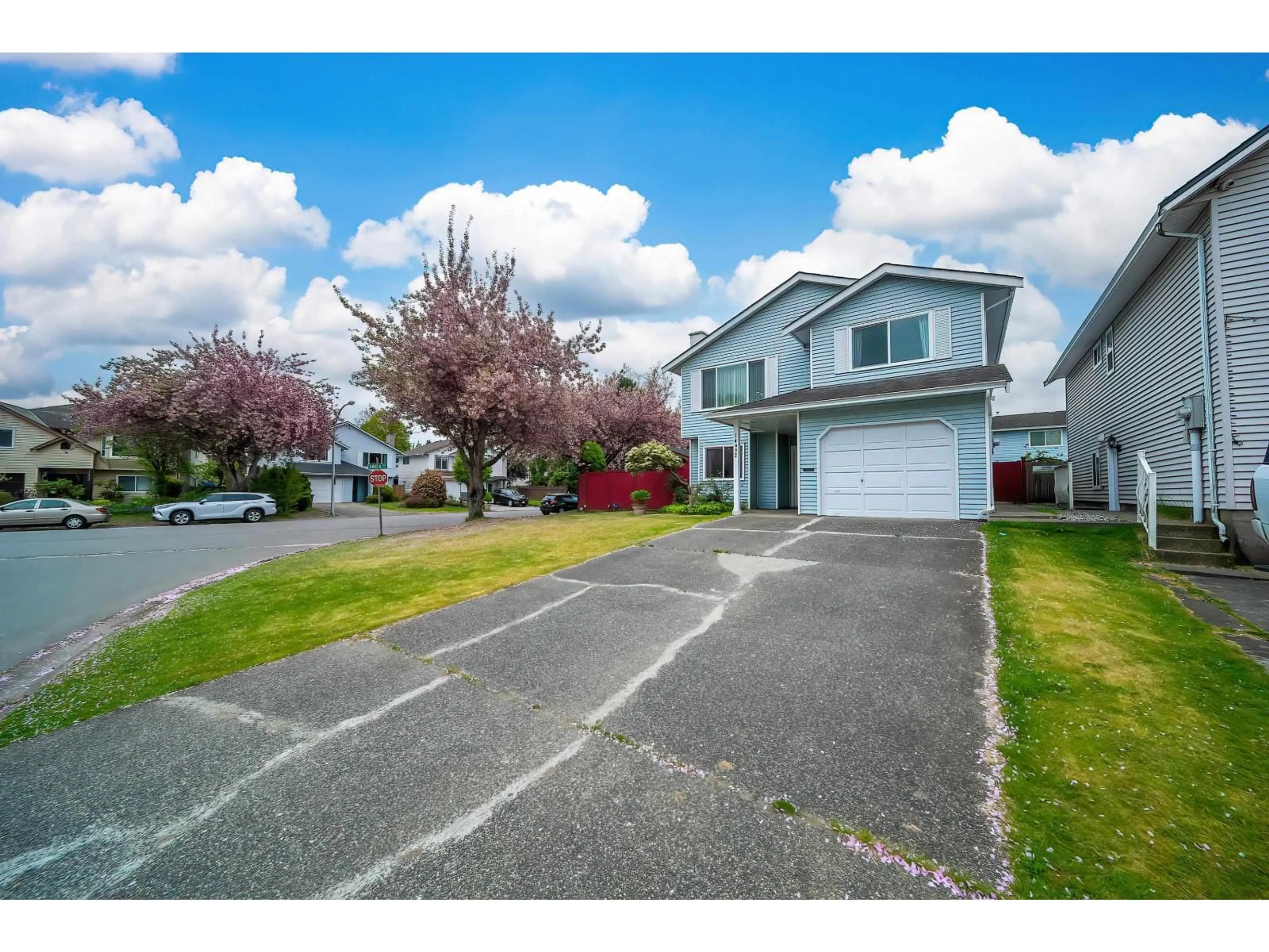 A pic from outside/outdoor area/front of a property/back of a property/a pic from drone, street for 14932 98A AVENUE, Surrey British Columbia V3R8H7