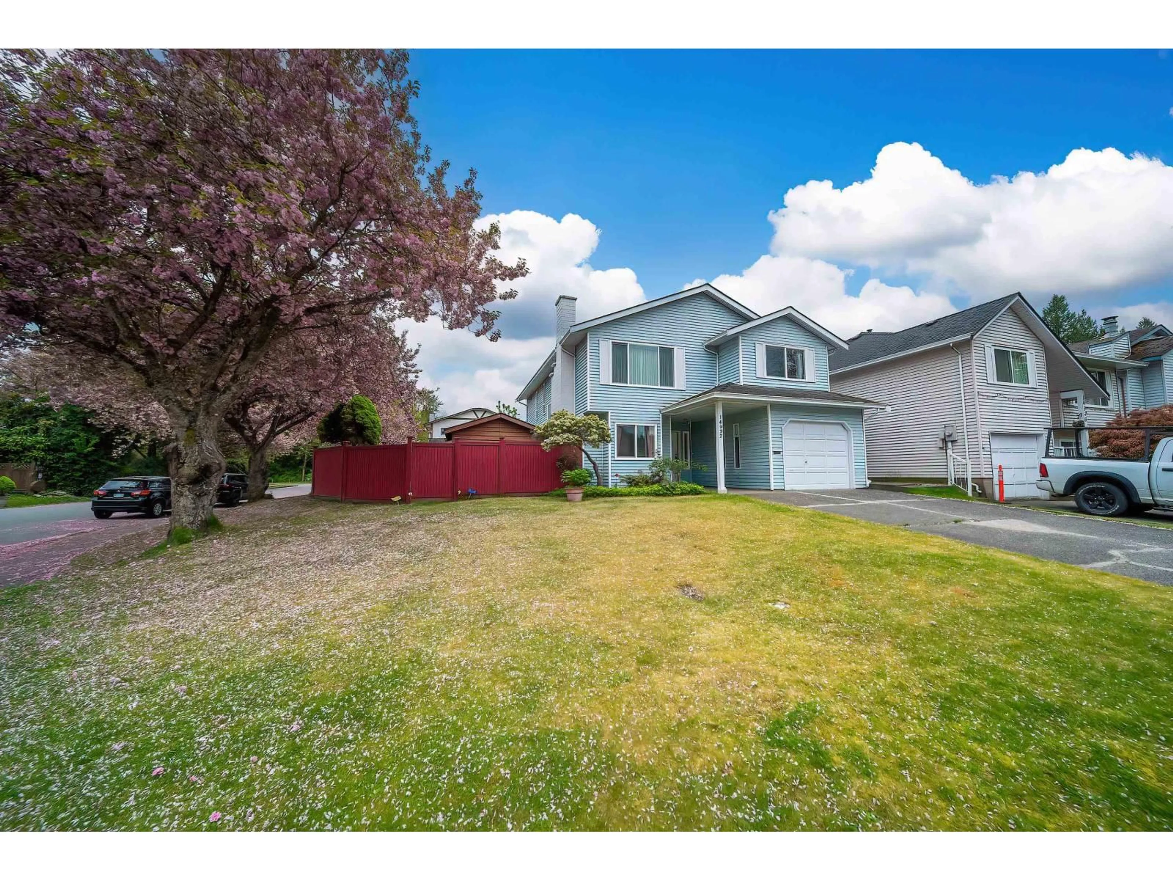 A pic from outside/outdoor area/front of a property/back of a property/a pic from drone, street for 14932 98A AVENUE, Surrey British Columbia V3R8H7