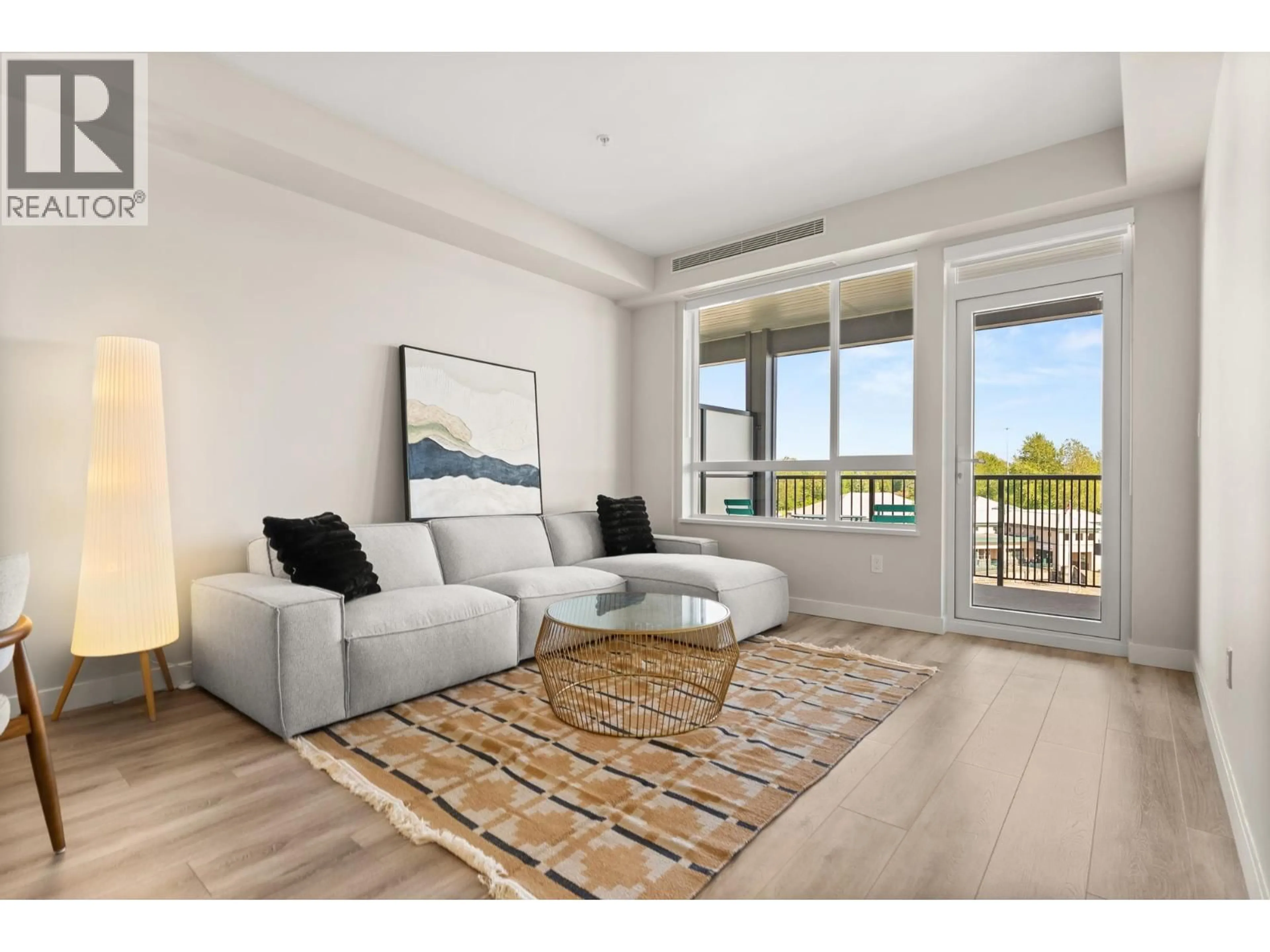 Living room with furniture, wood/laminate floor for 513 - 23222 GILLEY ROAD, Richmond British Columbia V6V0C8