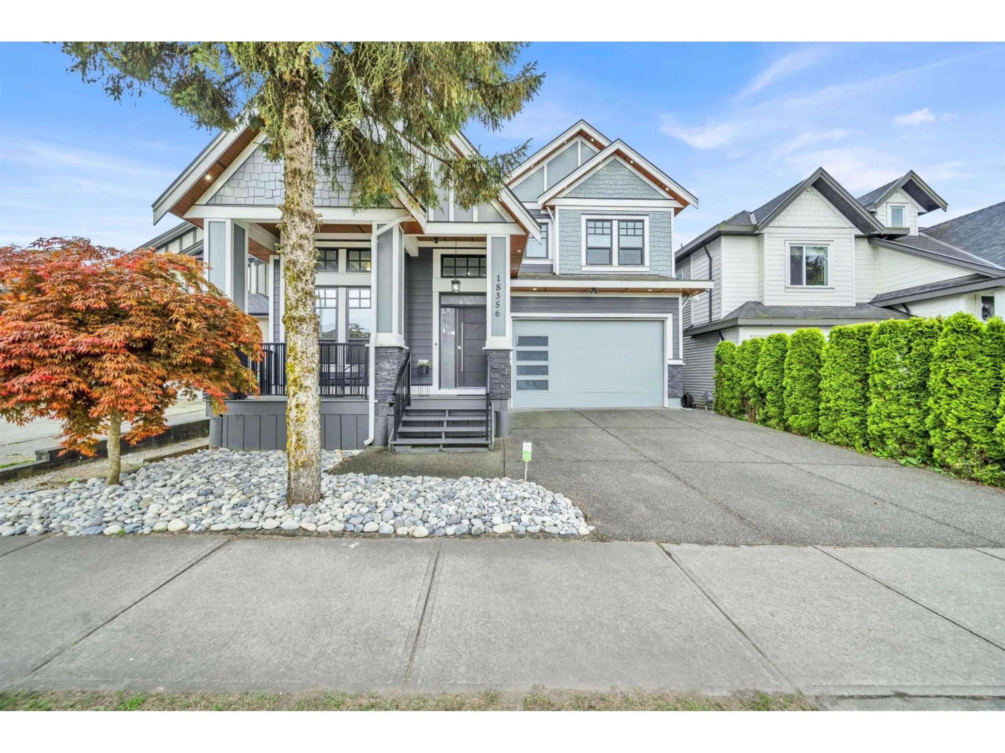 Home with vinyl exterior material, street for 18356 68 AVENUE, Surrey British Columbia V3S9H5