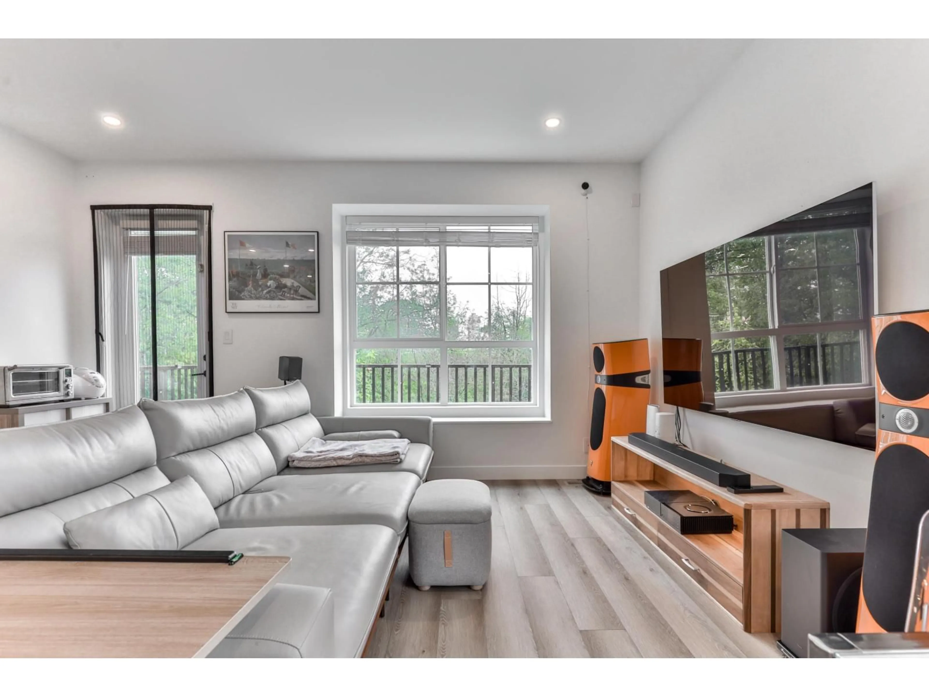 Living room with furniture, wood/laminate floor for 17 - 8120 200A STREET, Langley British Columbia V2Y3X5