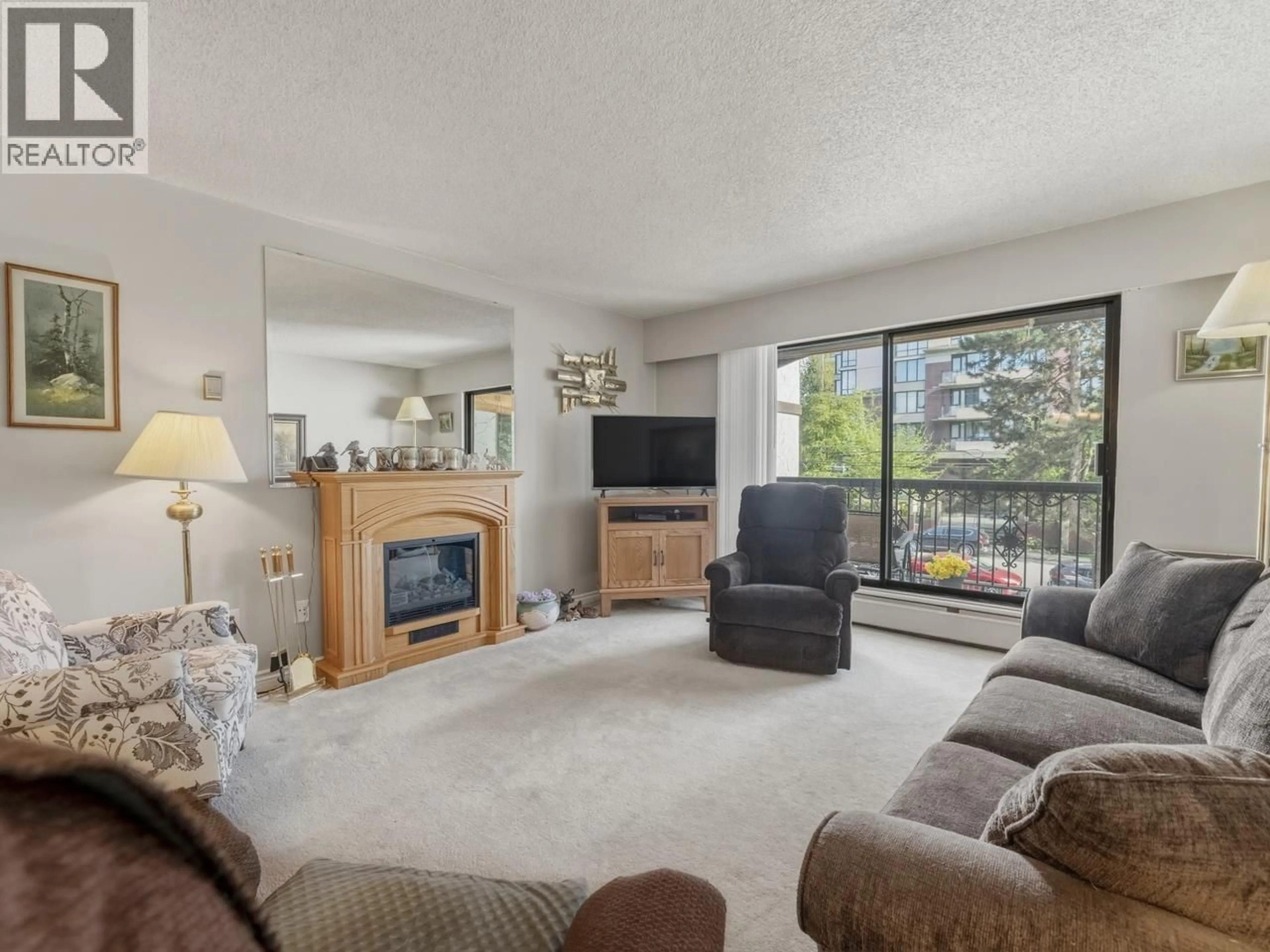 Living room with furniture, unknown for 206 - 721 HAMILTON STREET, New Westminster British Columbia V3M2M7
