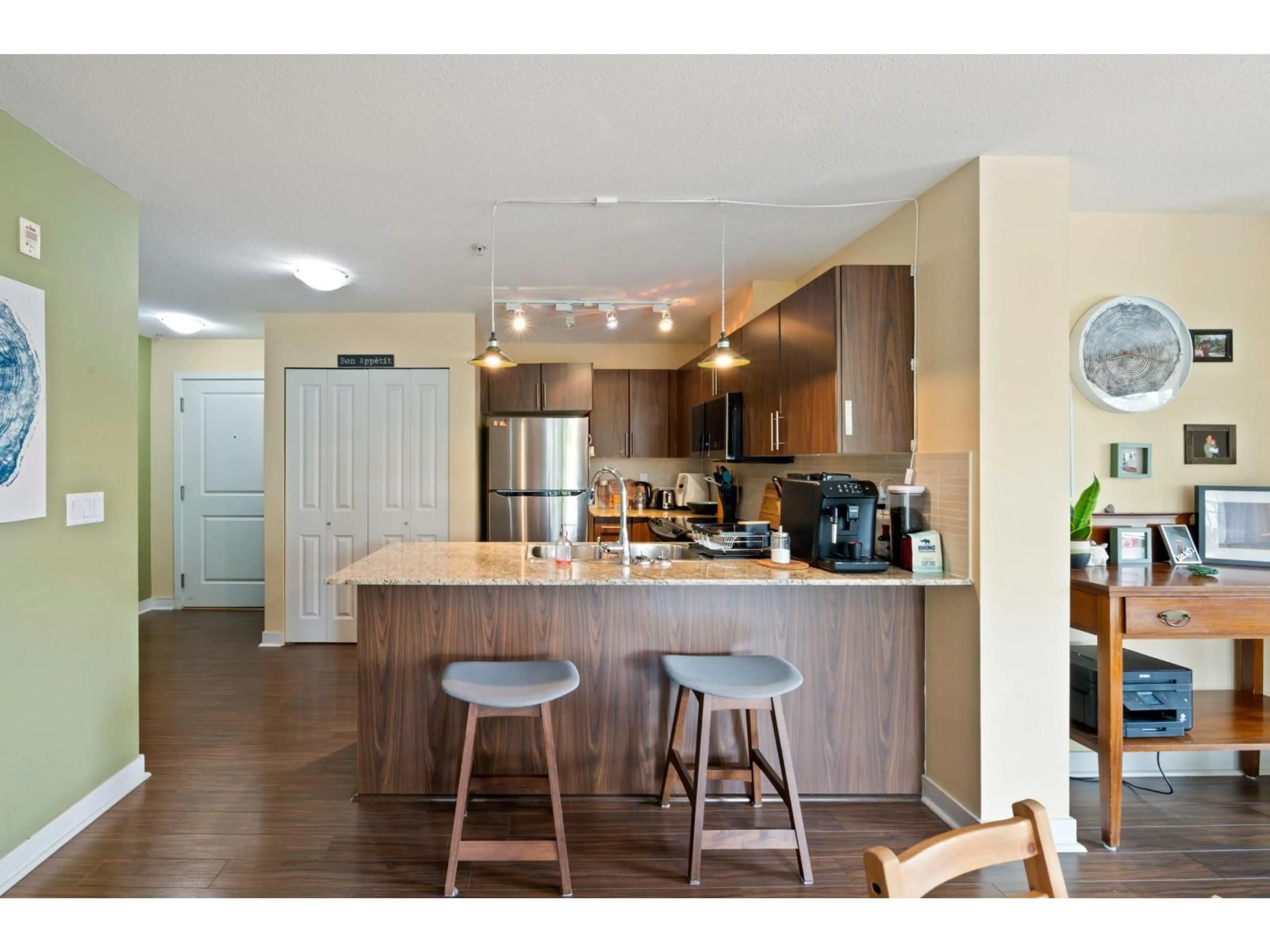 Open concept kitchen, wood/laminate floor for A315 - 8929 202 STREET, Langley British Columbia V1M0B4