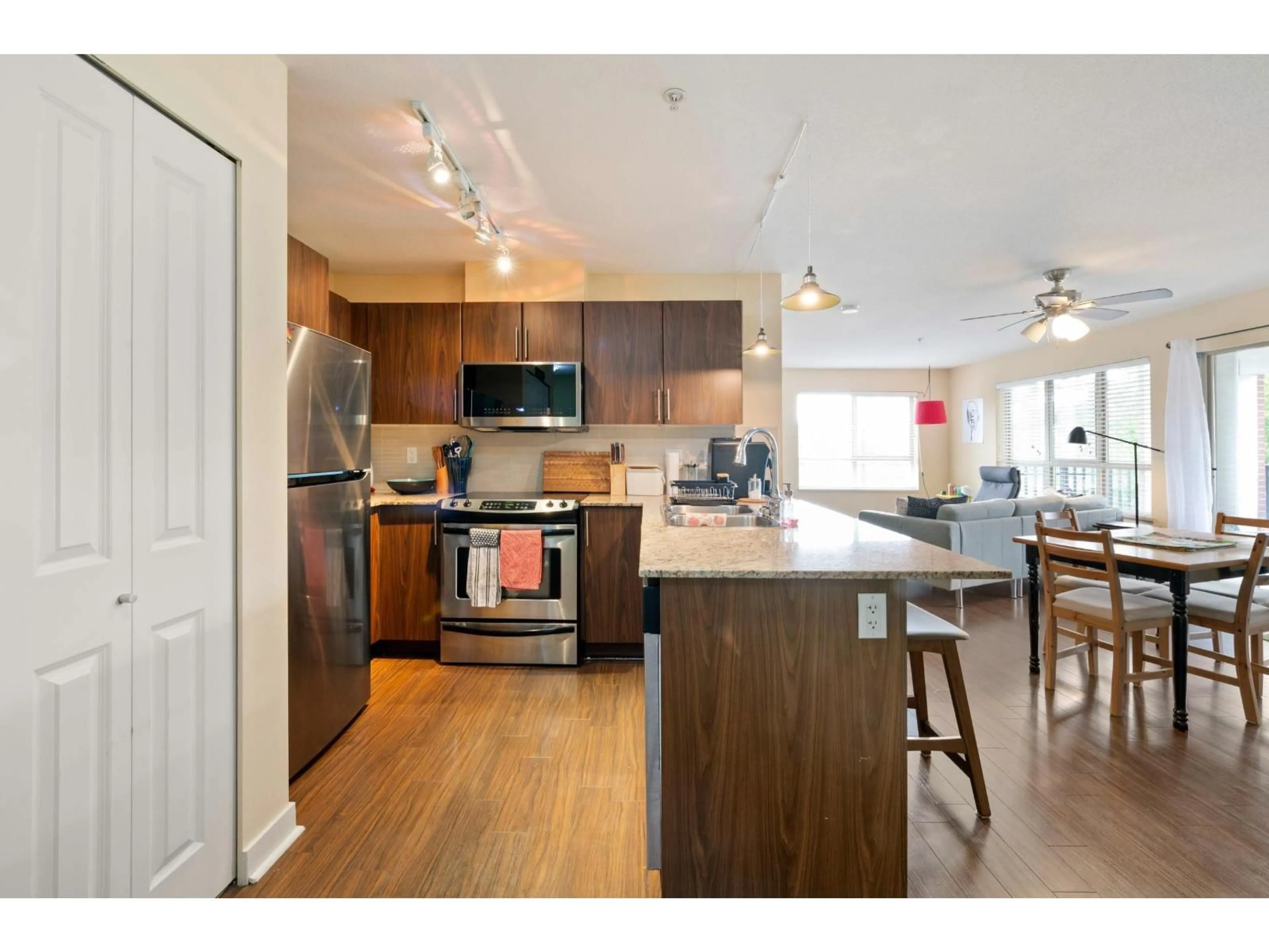 Open concept kitchen, wood/laminate floor for A315 - 8929 202 STREET, Langley British Columbia V1M0B4