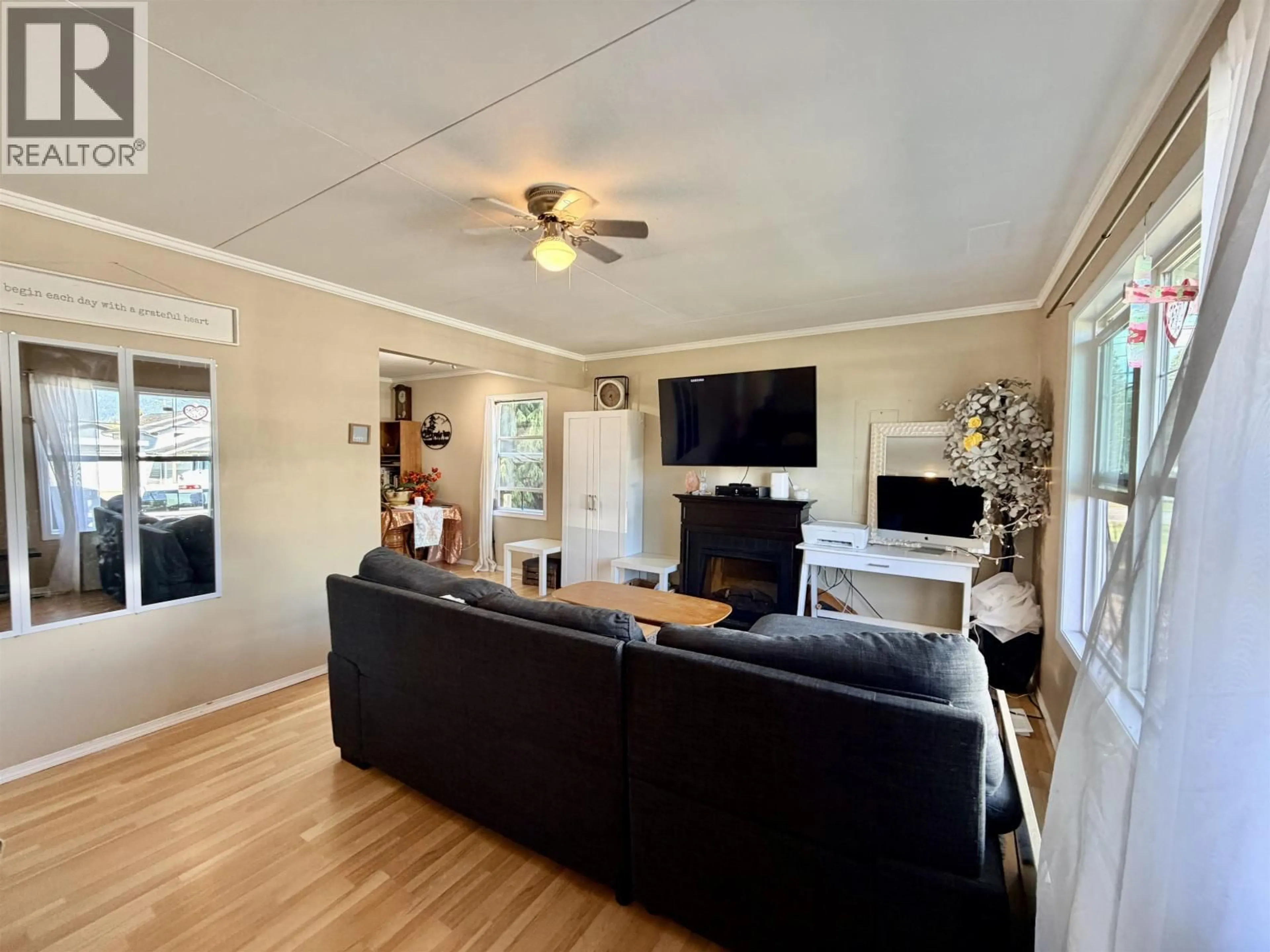 Living room with furniture, wood/laminate floor for 114 LILLOOET CRESCENT, Kitimat British Columbia V8C1Z8