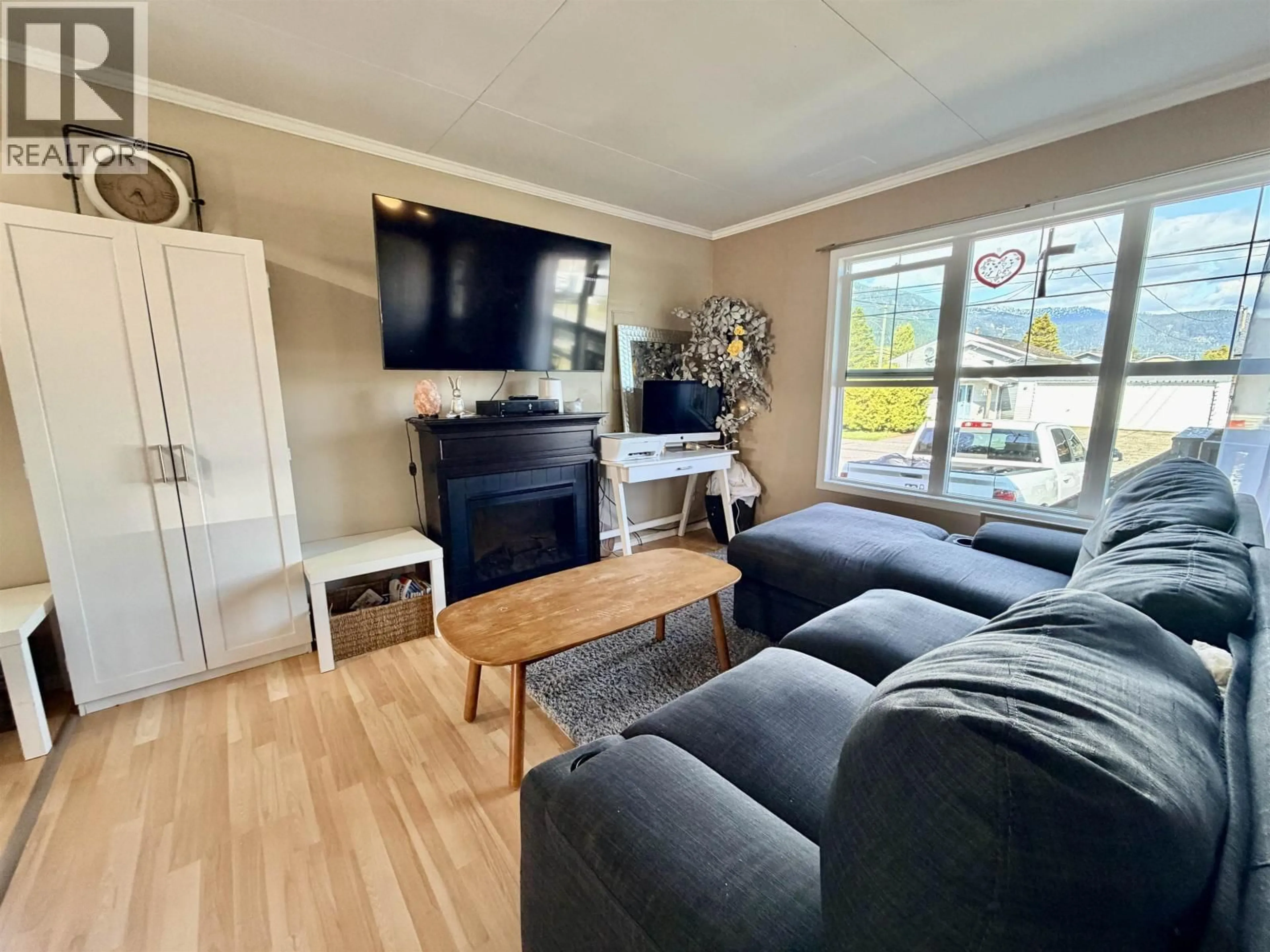 Living room with furniture, wood/laminate floor for 114 LILLOOET CRESCENT, Kitimat British Columbia V8C1Z8