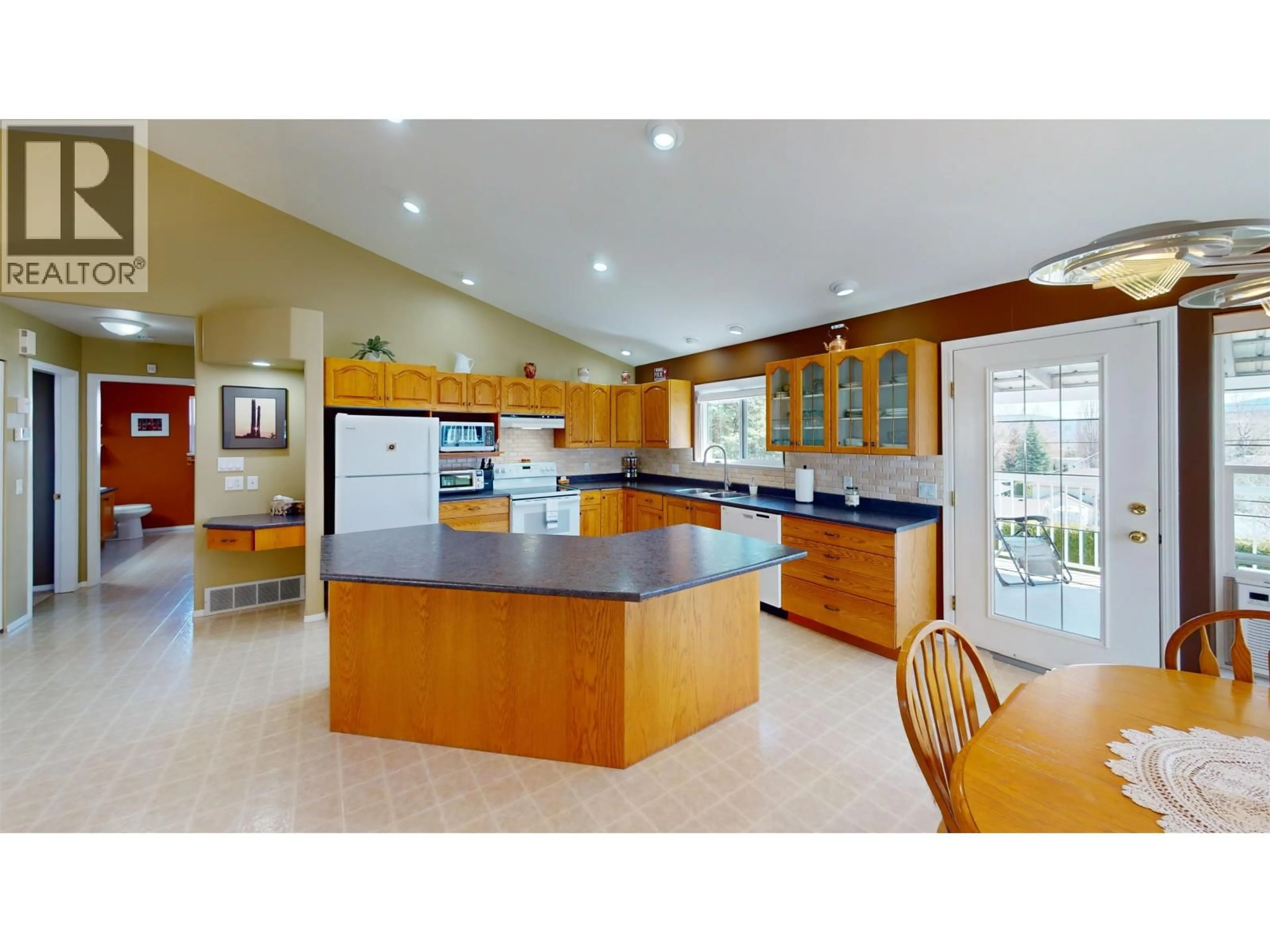 Open concept kitchen, ceramic/tile floor for 570 PIERCE CRESCENT, Quesnel British Columbia V2J4X8