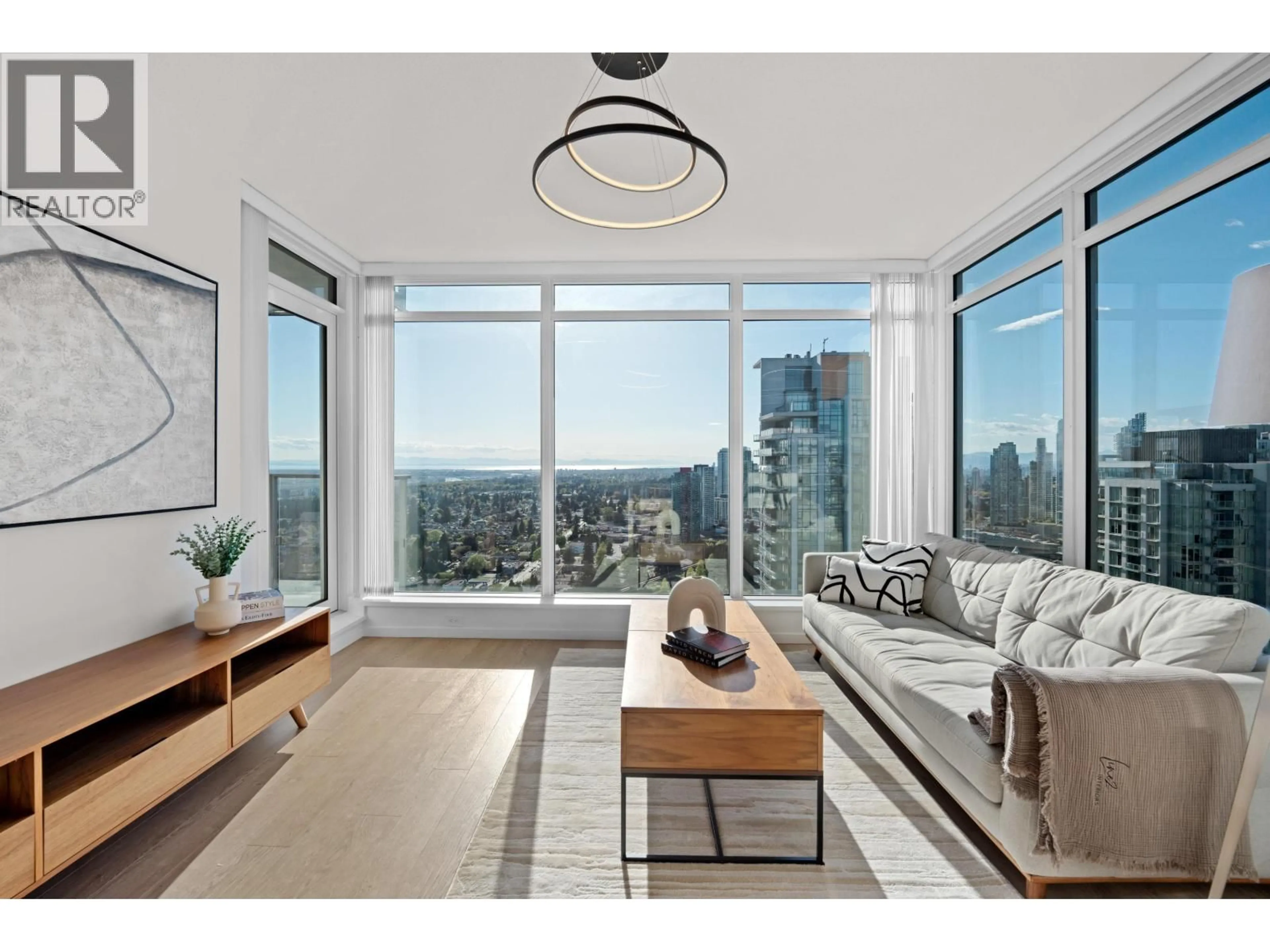 Living room with furniture, wood/laminate floor for 3603 - 6700 DUNBLANE AVENUE, Burnaby British Columbia V5H0J3