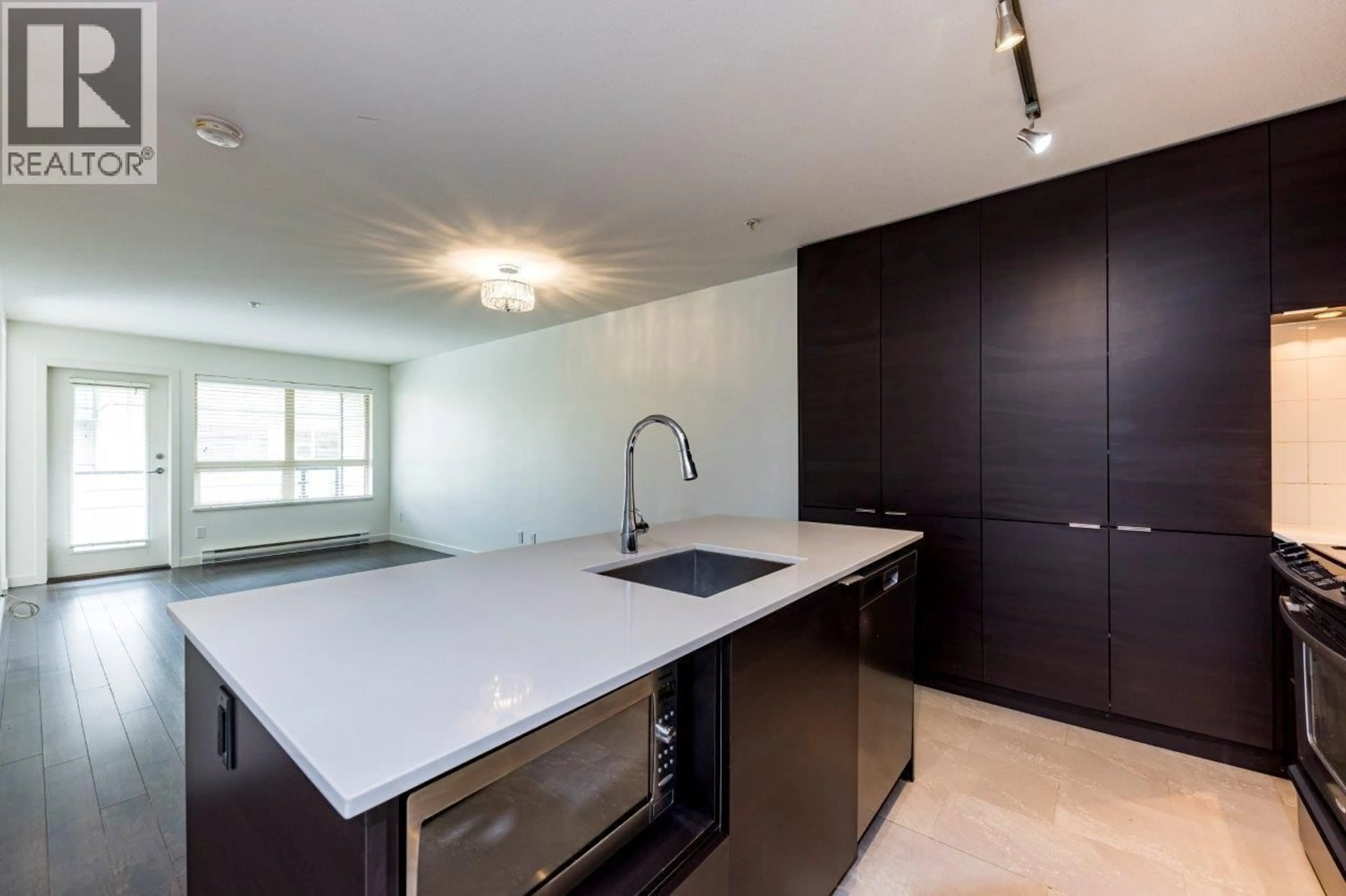 Open concept kitchen, unknown for 302 - 1677 LLOYD AVENUE, North Vancouver British Columbia V7P0B1