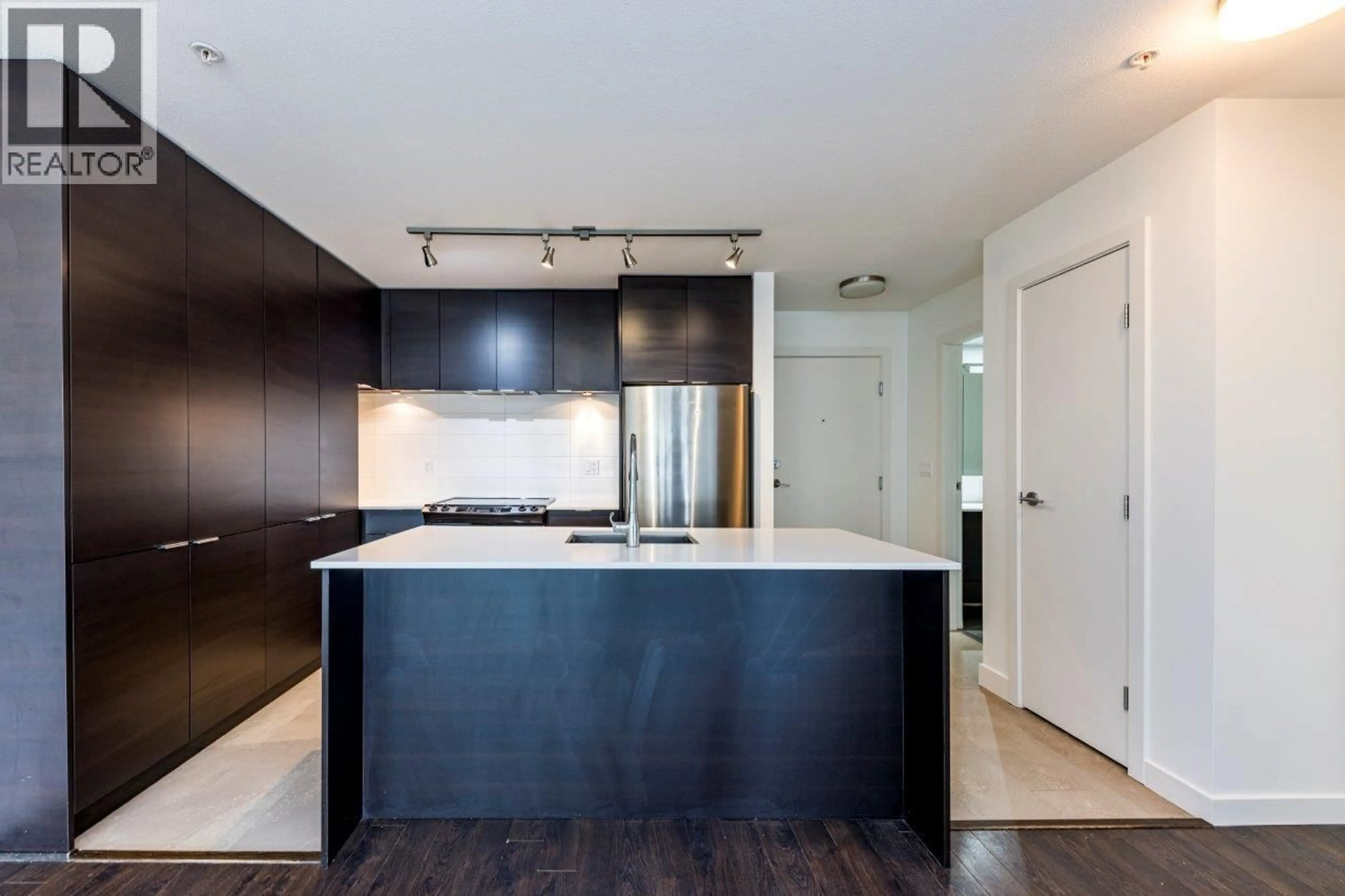Open concept kitchen, unknown for 302 - 1677 LLOYD AVENUE, North Vancouver British Columbia V7P0B1