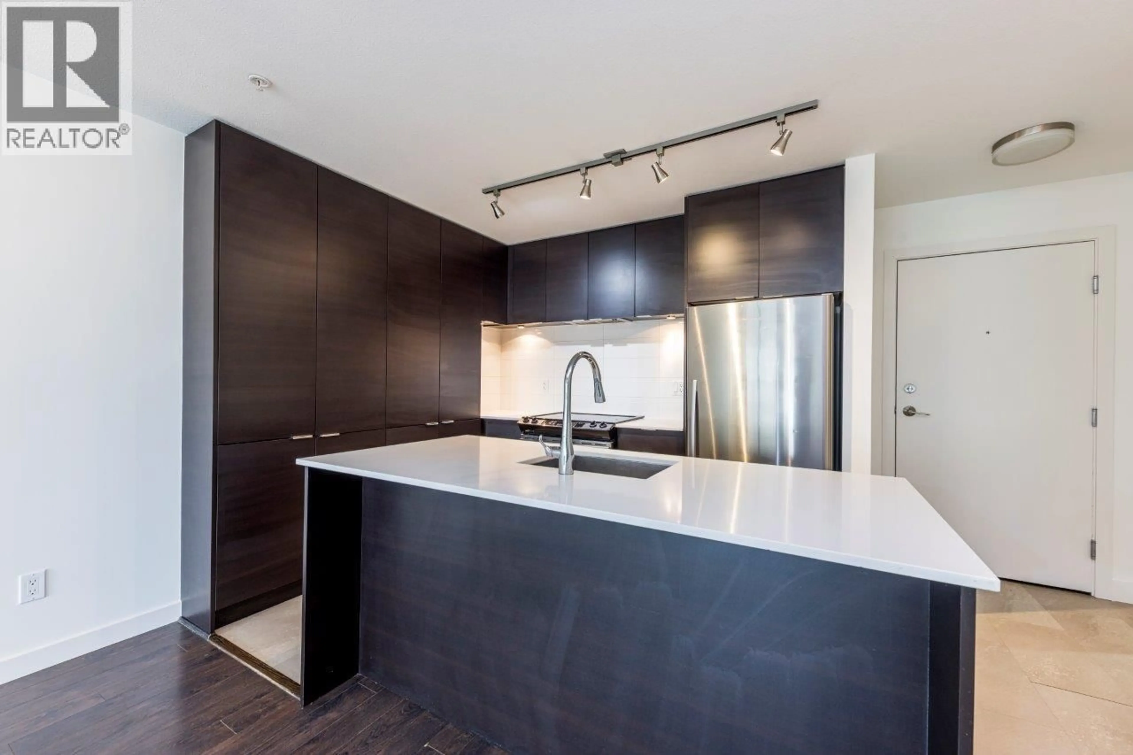 Open concept kitchen, unknown for 302 - 1677 LLOYD AVENUE, North Vancouver British Columbia V7P0B1