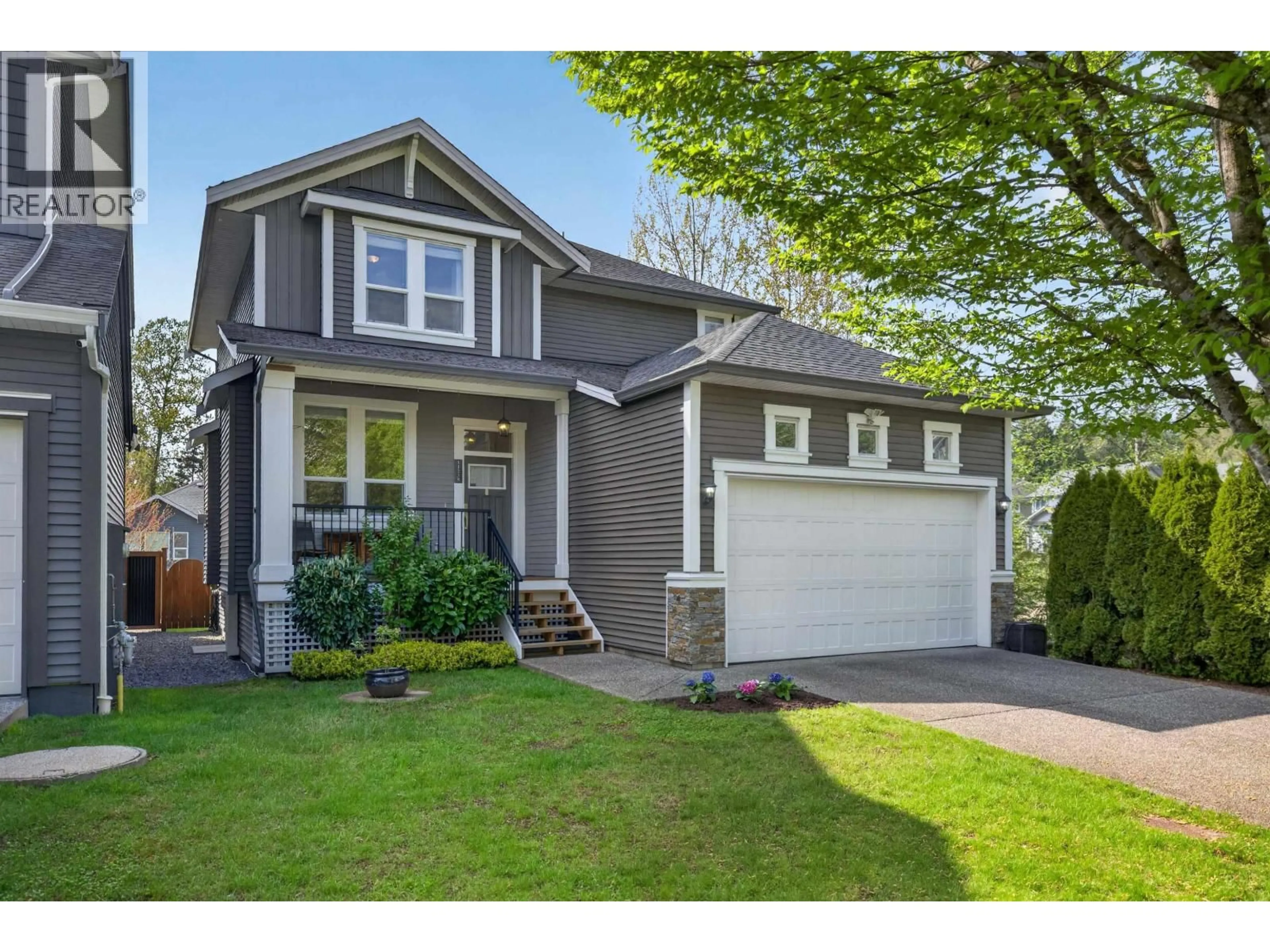 Home with vinyl exterior material, street for 11235 244 STREET, Maple Ridge British Columbia V2W0H4