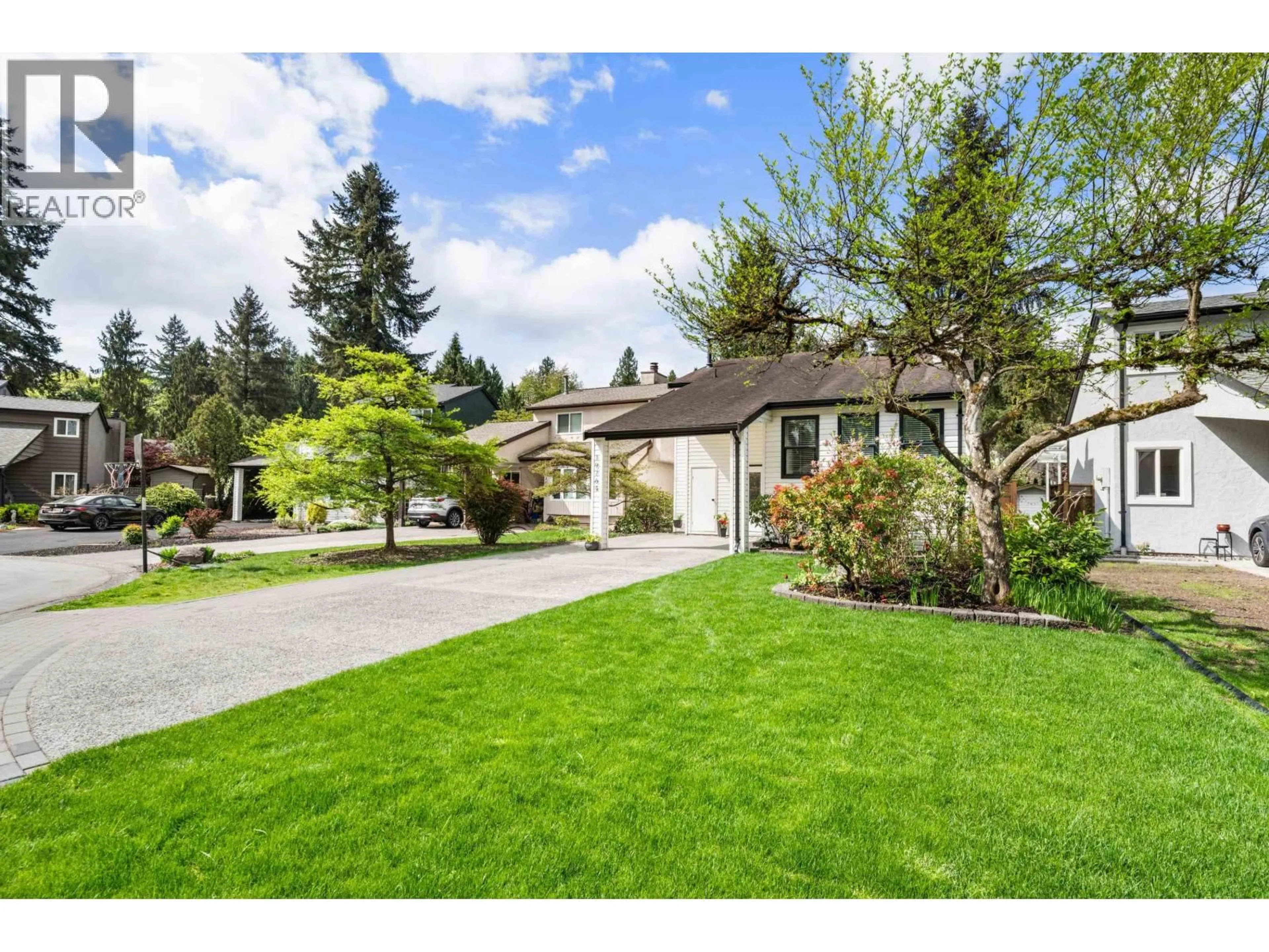 Home with vinyl exterior material, street for 19764 WILDCREST AVENUE, Pitt Meadows British Columbia V3Y1M2