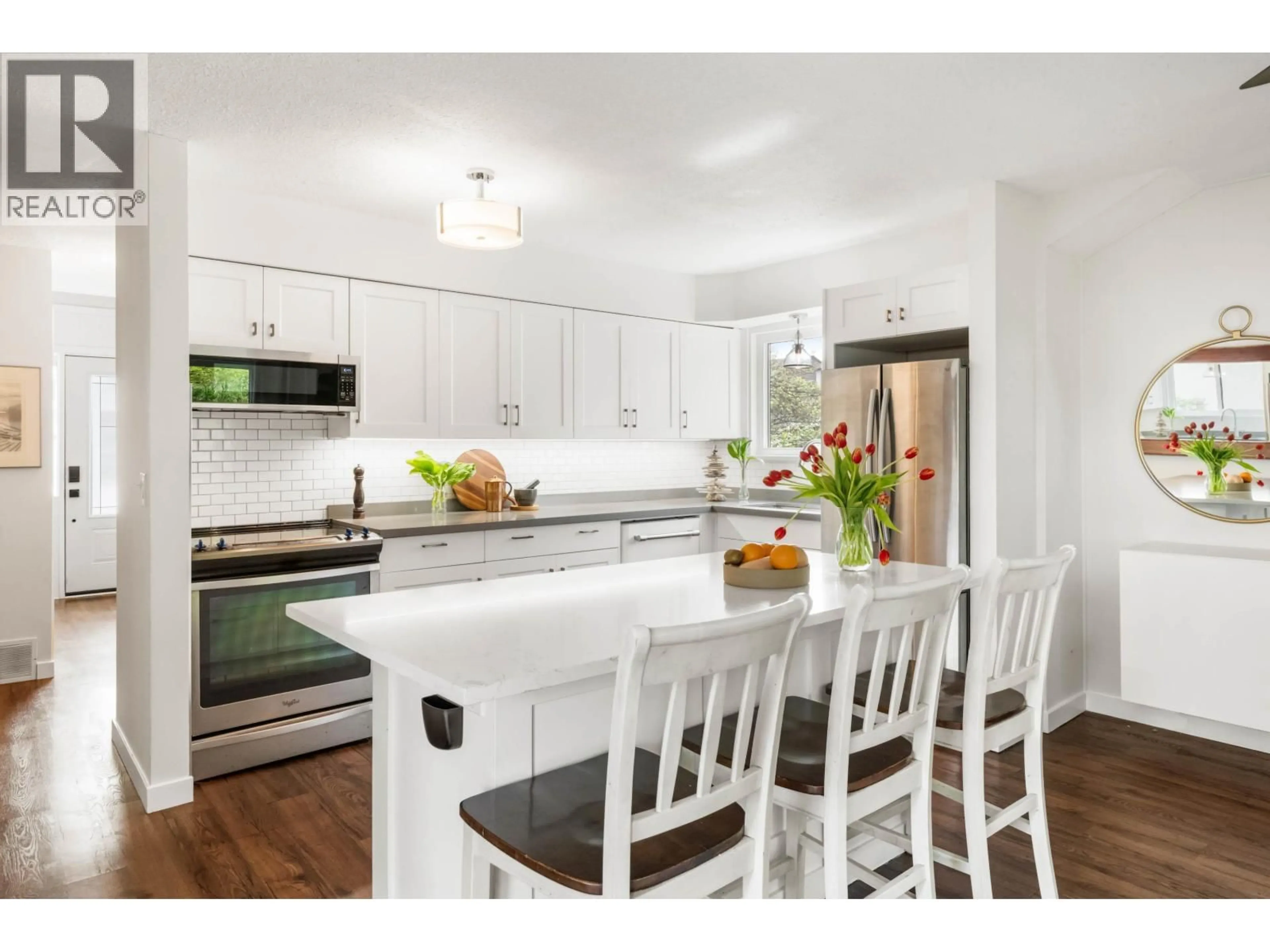 Open concept kitchen, wood/laminate floor for 19764 WILDCREST AVENUE, Pitt Meadows British Columbia V3Y1M2