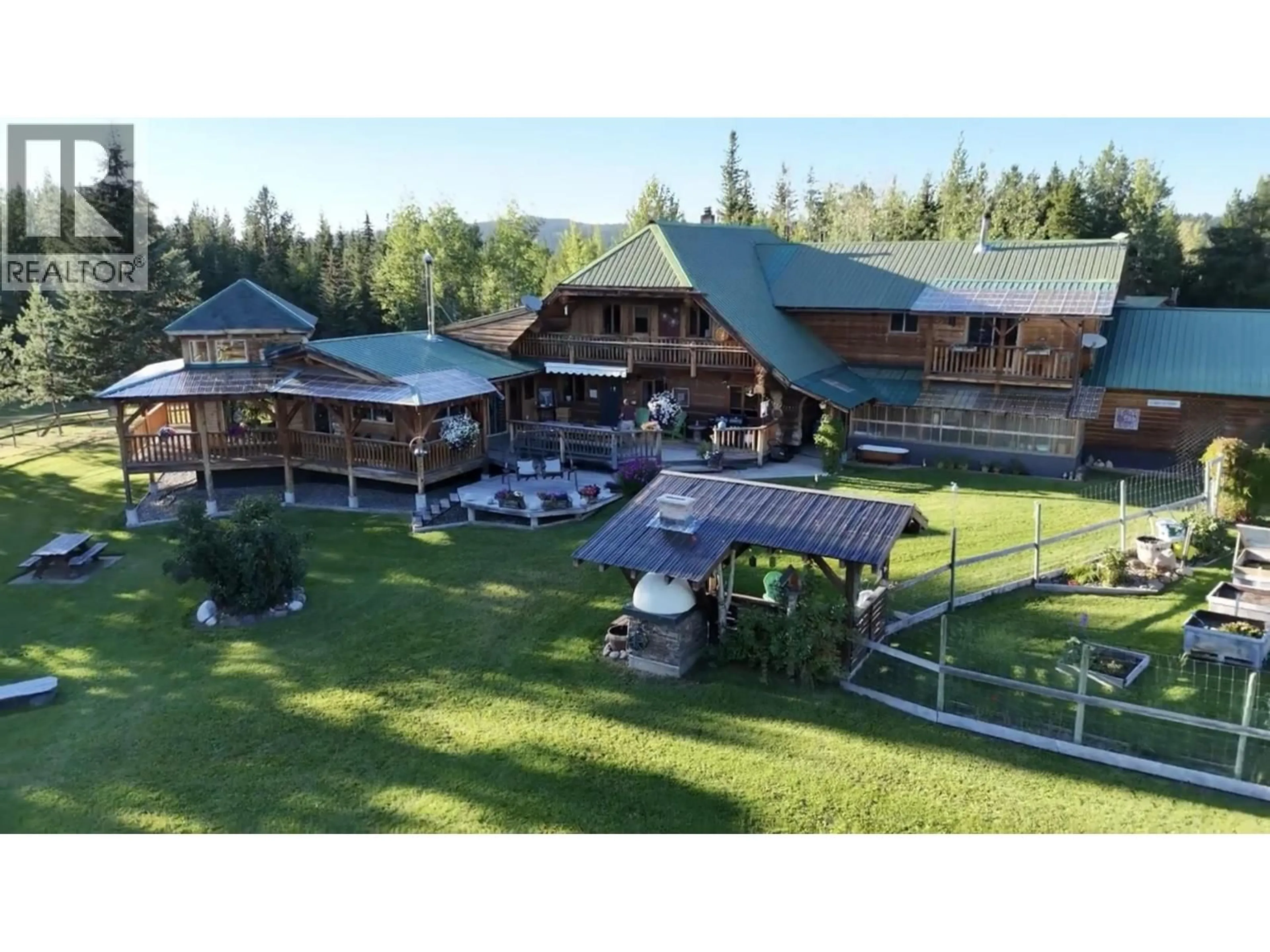 A pic from outside/outdoor area/front of a property/back of a property/a pic from drone, mountain view for 2982 BIG LAKE ROAD, Williams Lake British Columbia V0L1G0
