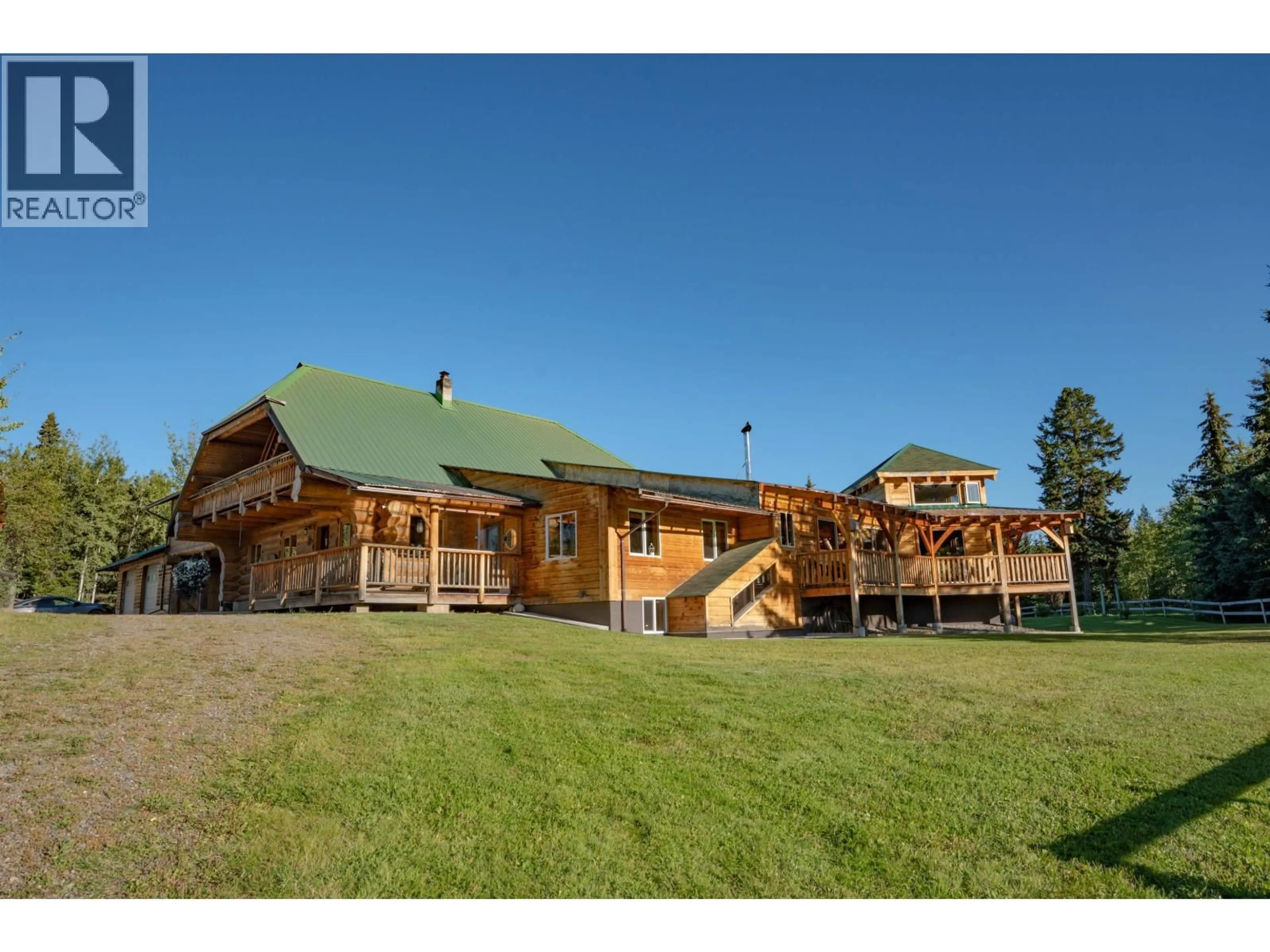 A pic from outside/outdoor area/front of a property/back of a property/a pic from drone, building for 2982 BIG LAKE ROAD, Williams Lake British Columbia V0L1G0