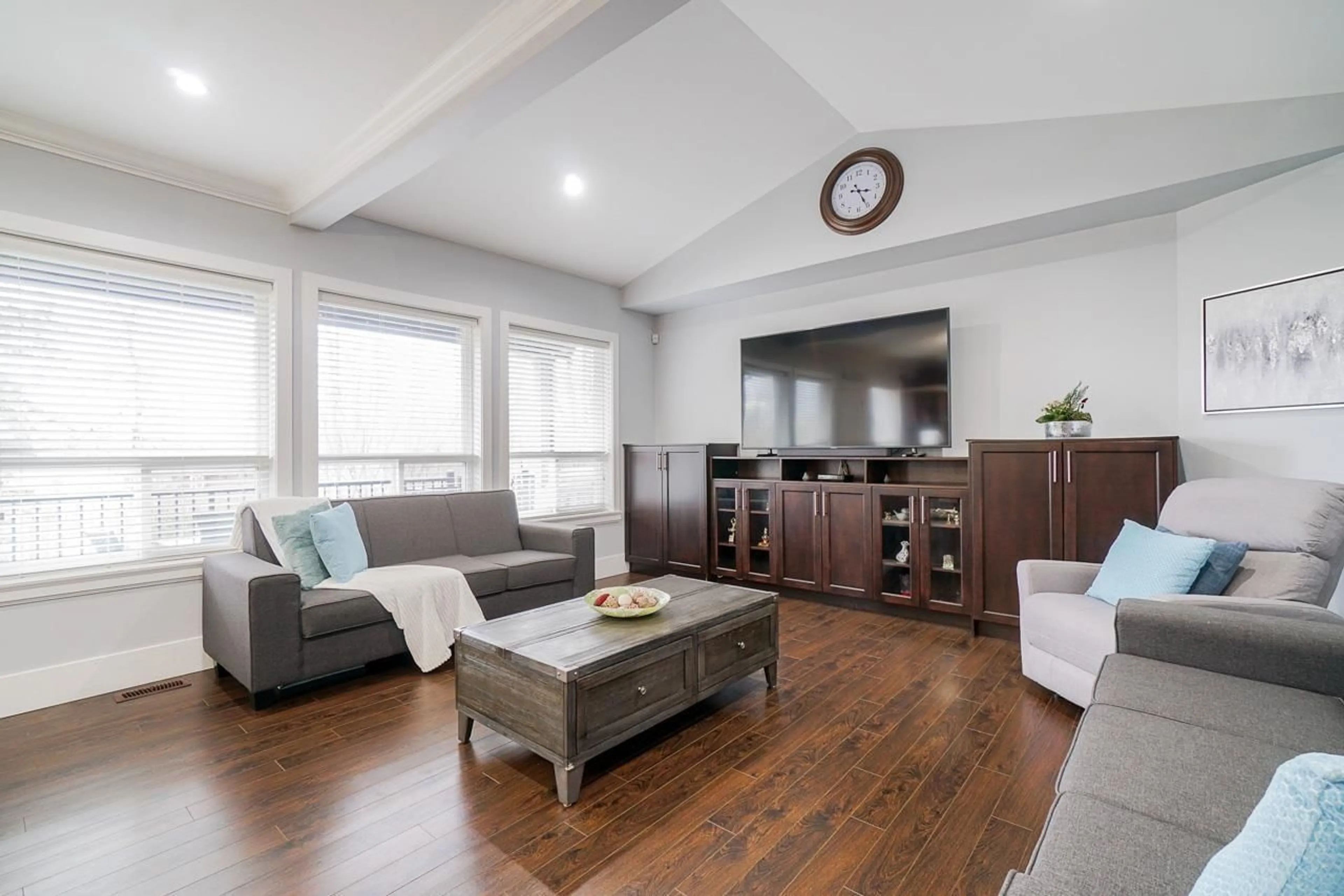 Living room with furniture, wood/laminate floor for 17742 102 AVENUE, Surrey British Columbia V4N5V8