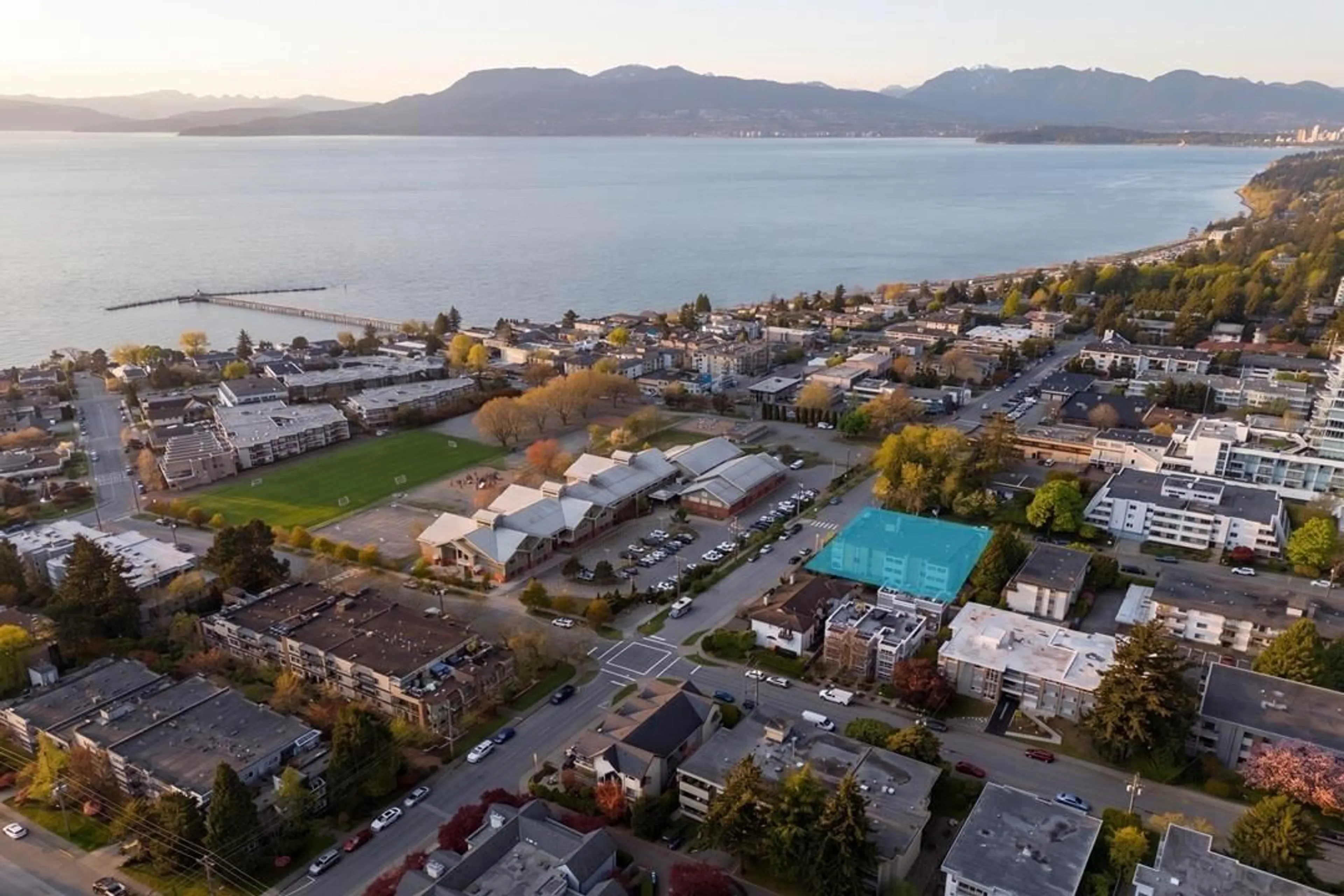 A pic from outside/outdoor area/front of a property/back of a property/a pic from drone, water/lake/river/ocean view for 105 - 15265 ROPER AVENUE, White Rock British Columbia V4B2E9