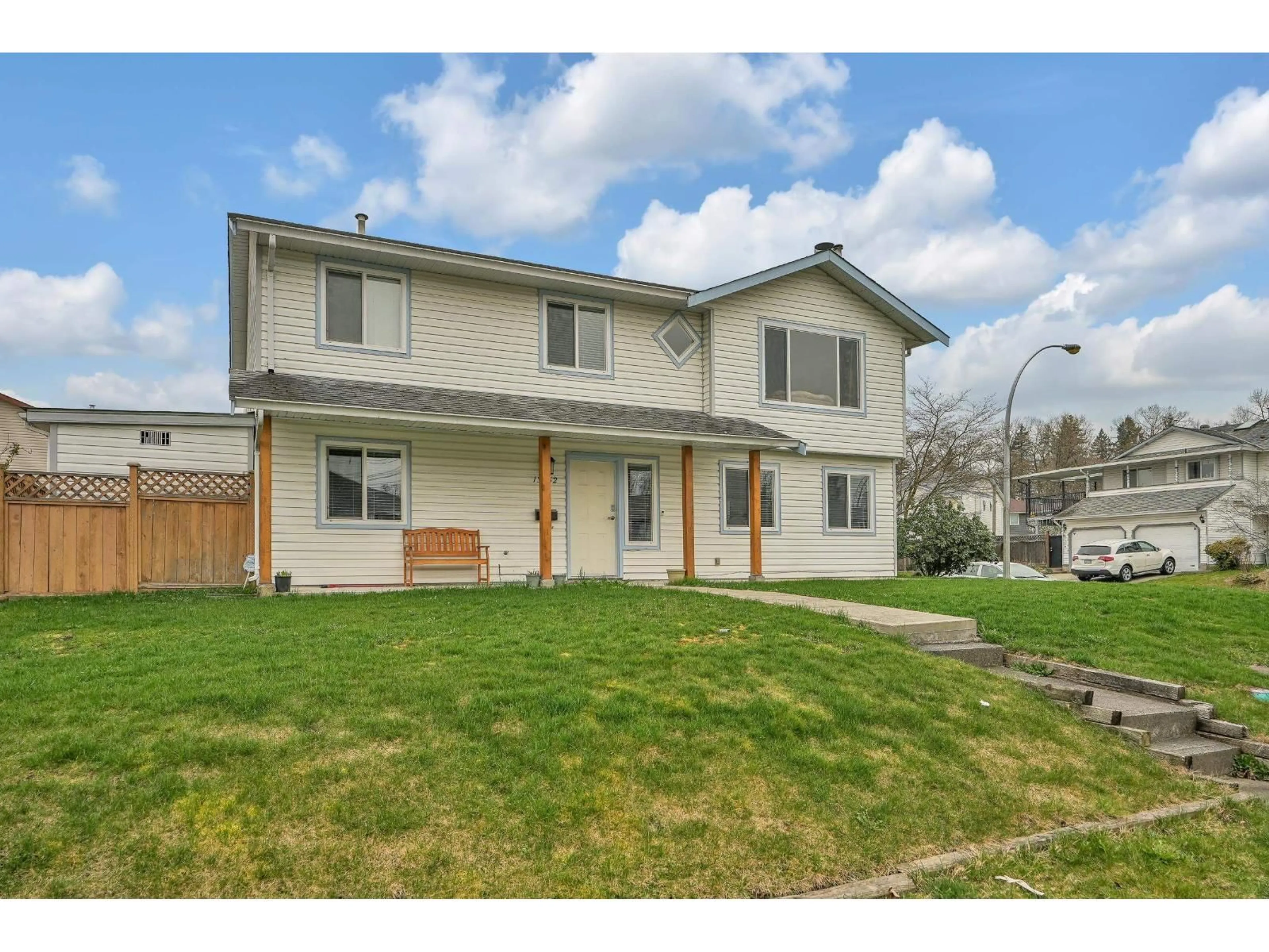 Home with vinyl exterior material, street for 13452 85 AVENUE, Surrey British Columbia V3W0T8