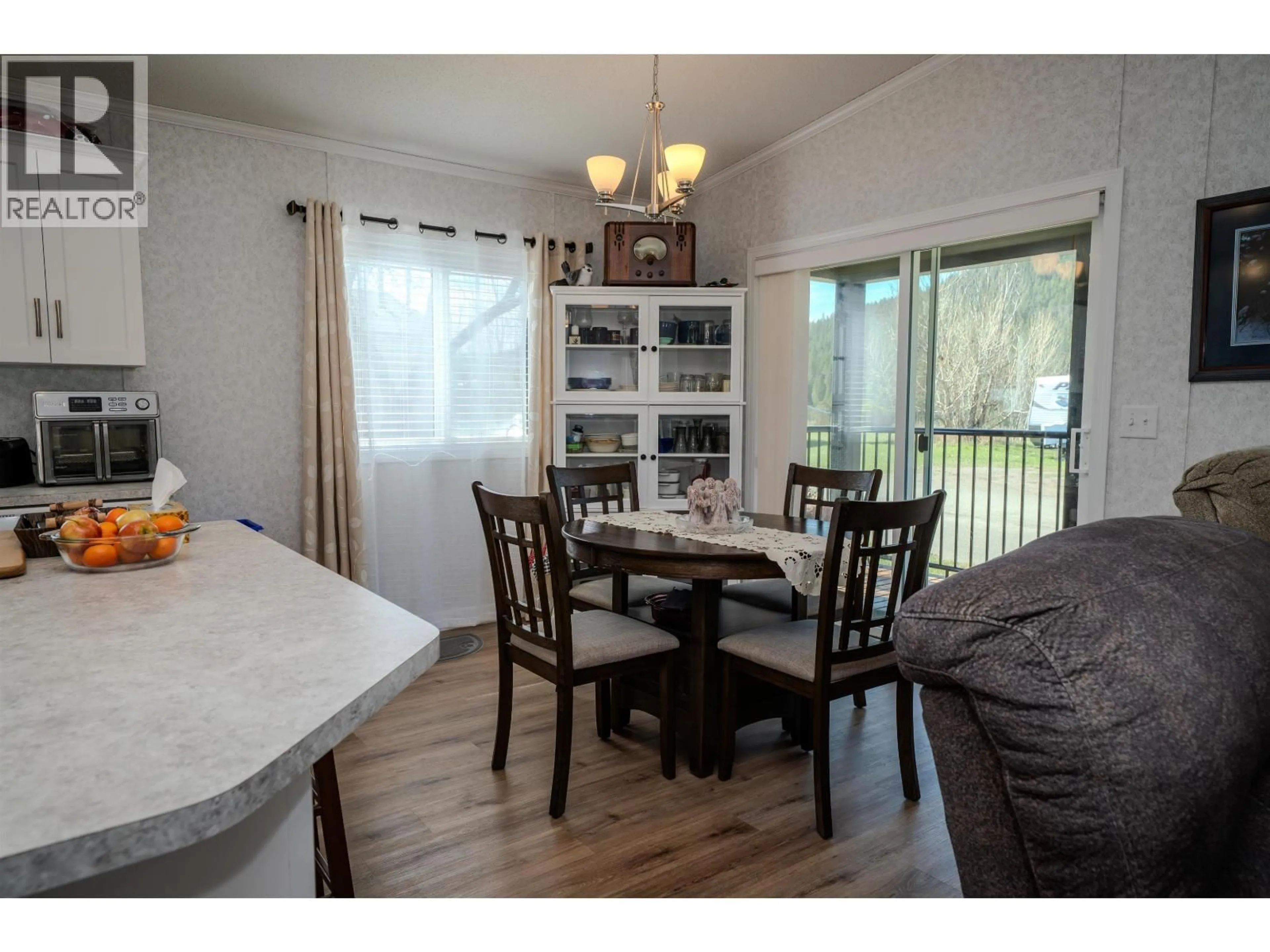 Dining room, wood/laminate floor for 56 - 3001 MACKENZIE AVENUE, Williams Lake British Columbia V2G3N9