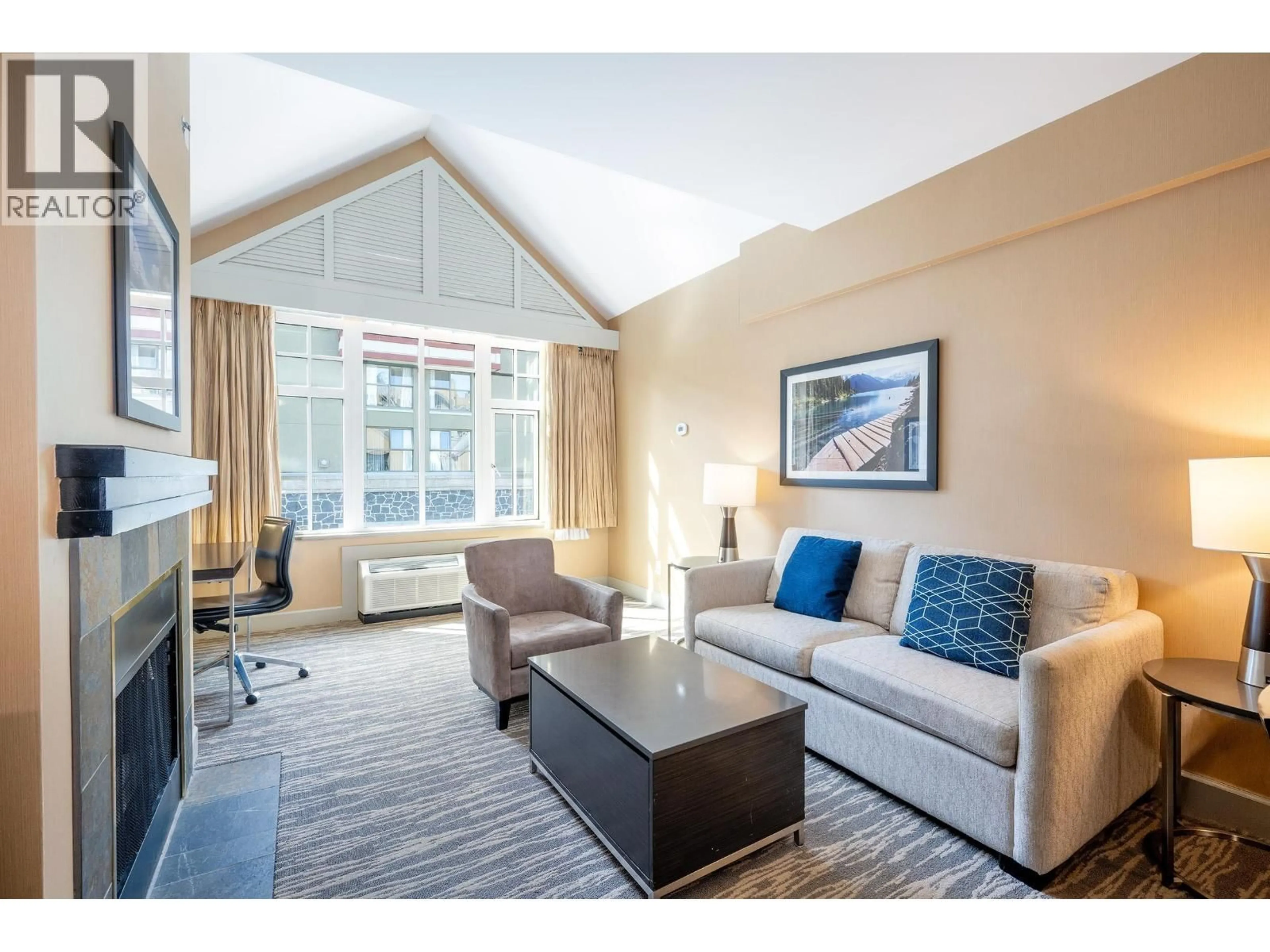 Living room with furniture, unknown for 560 - 4050 WHISTLER WAY, Whistler British Columbia V8E1H9