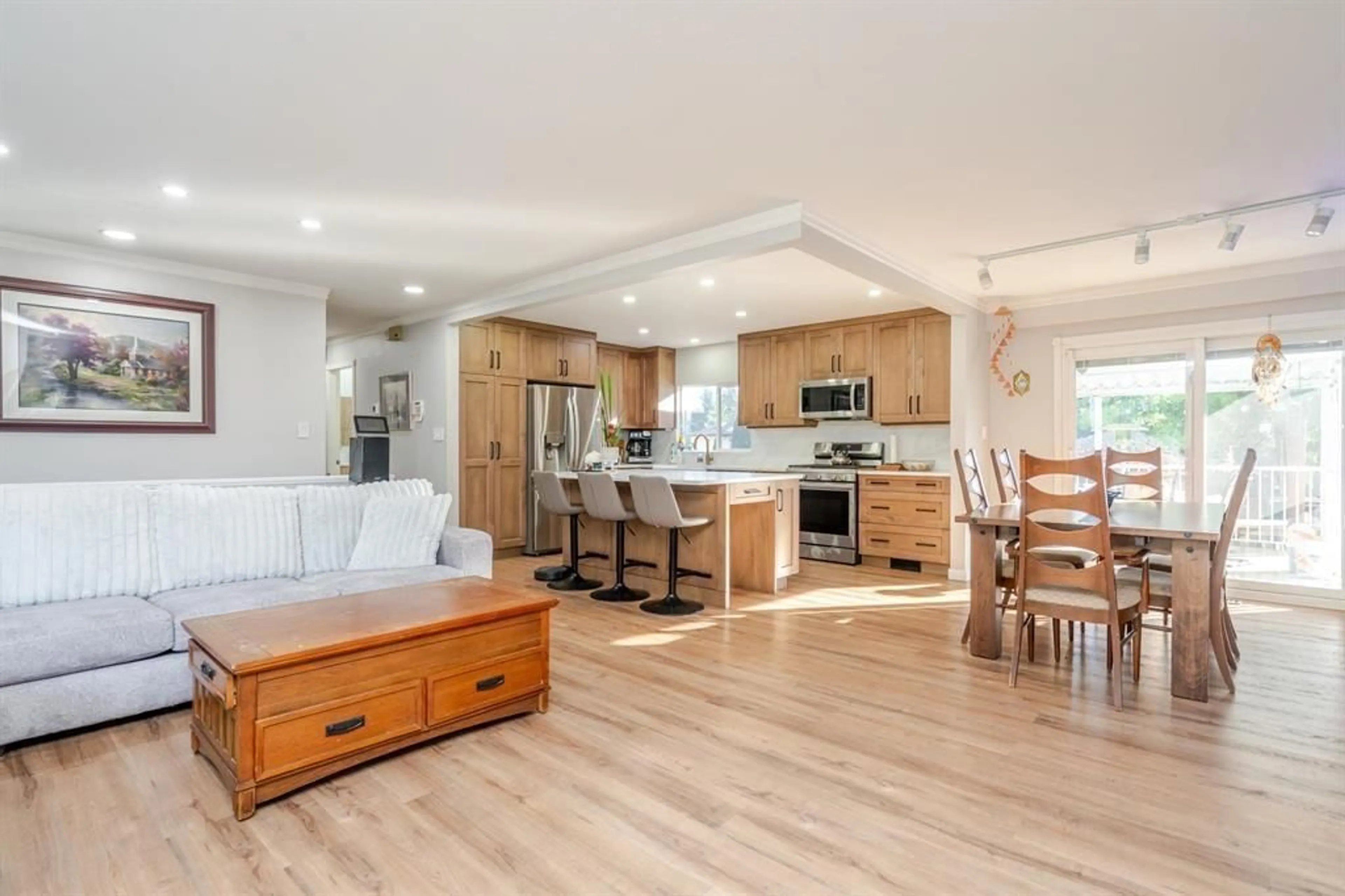 Open concept kitchen, wood/laminate floor for 3924 205B STREET, Langley British Columbia V3A2B3