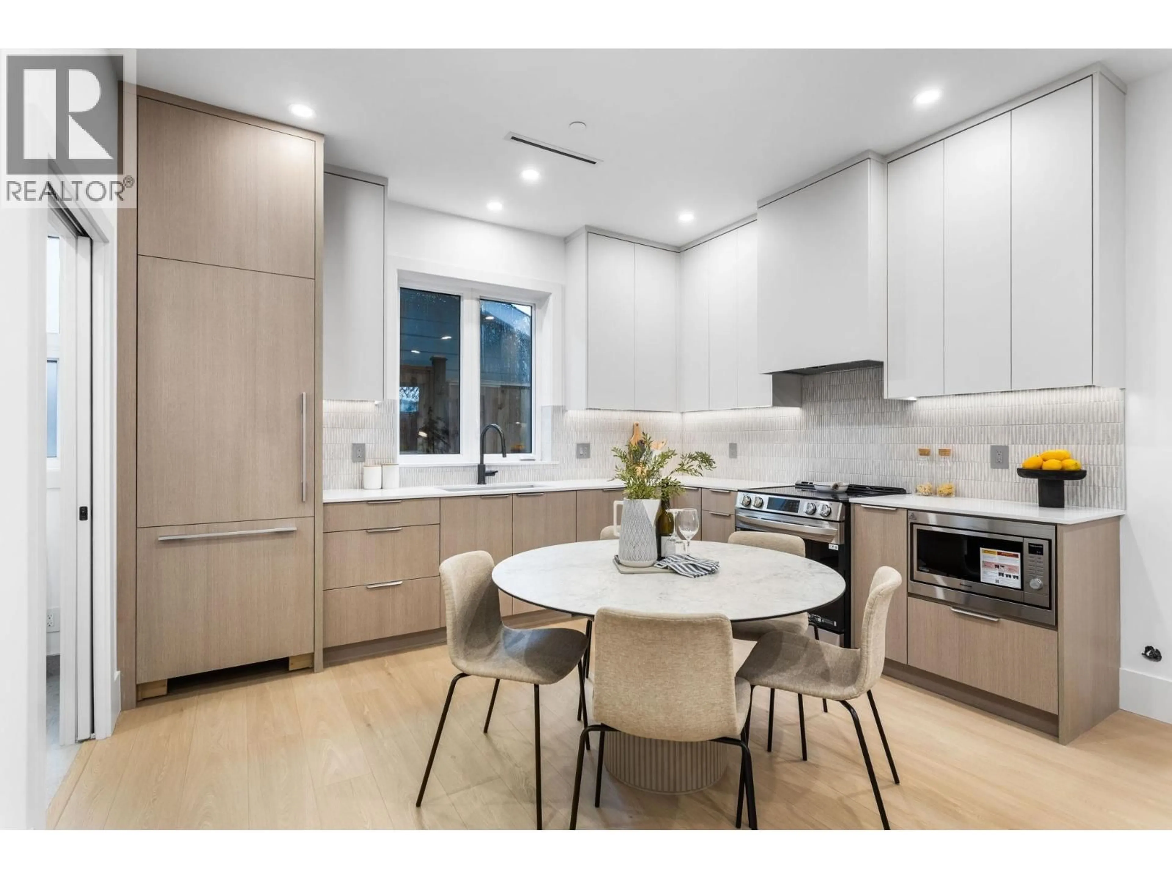 Contemporary kitchen, ceramic/tile floor for 3277 GRAVELEY STREET, Vancouver British Columbia V5K3K8