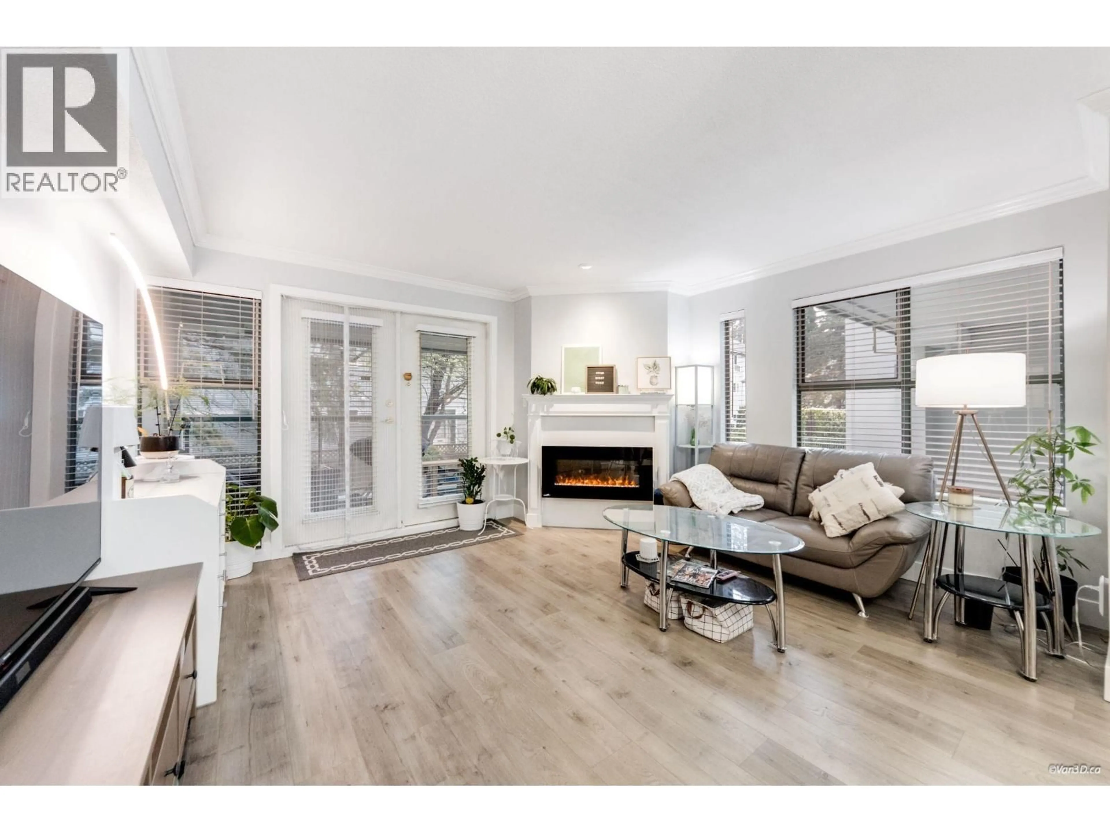 Living room with furniture, wood/laminate floor for 204B - 7025 STRIDE AVENUE, Burnaby British Columbia V3N4Y1
