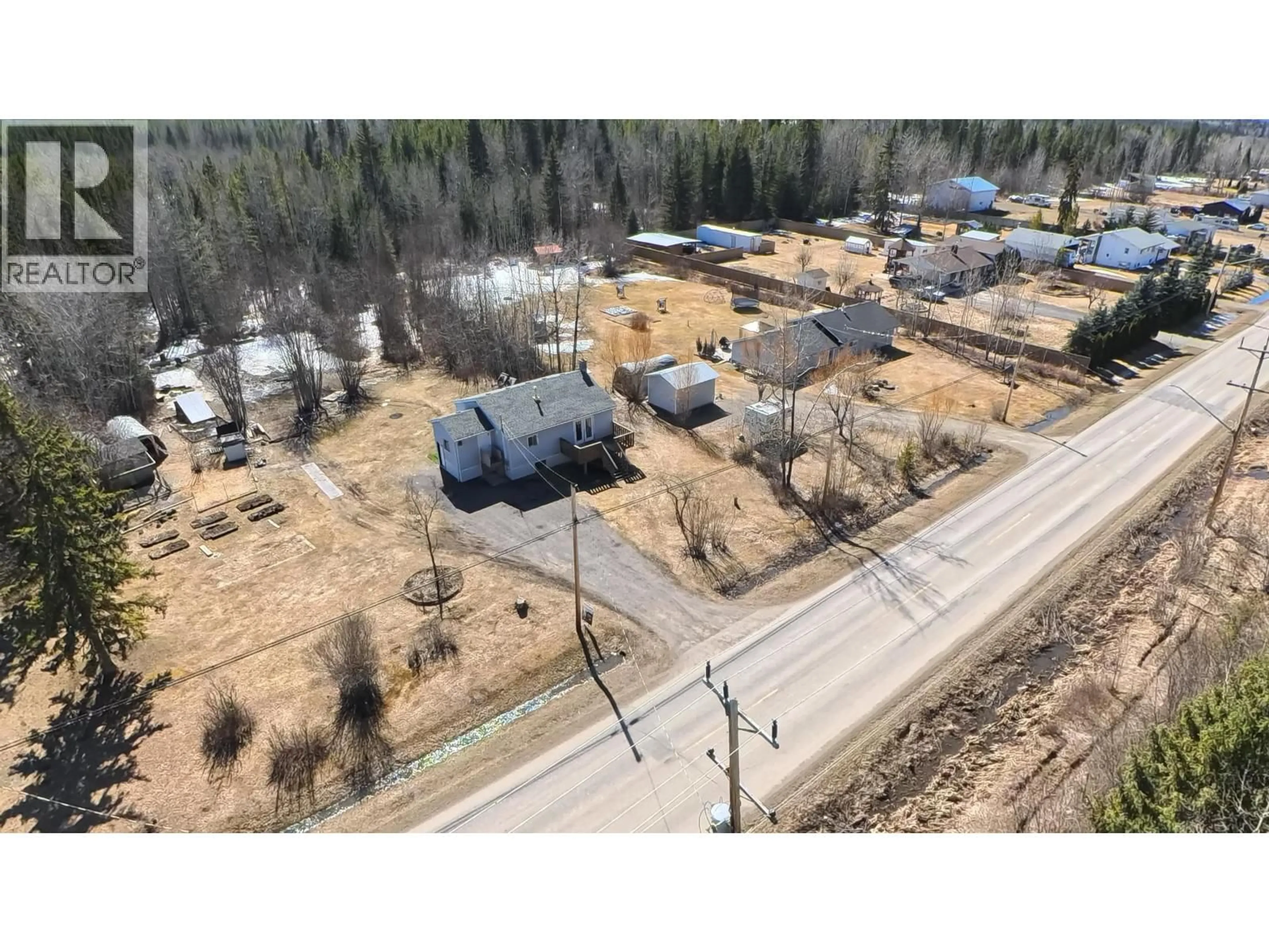 A pic from outside/outdoor area/front of a property/back of a property/a pic from drone, street for 5565 BENDIXON ROAD, Prince George British Columbia V2N5V3