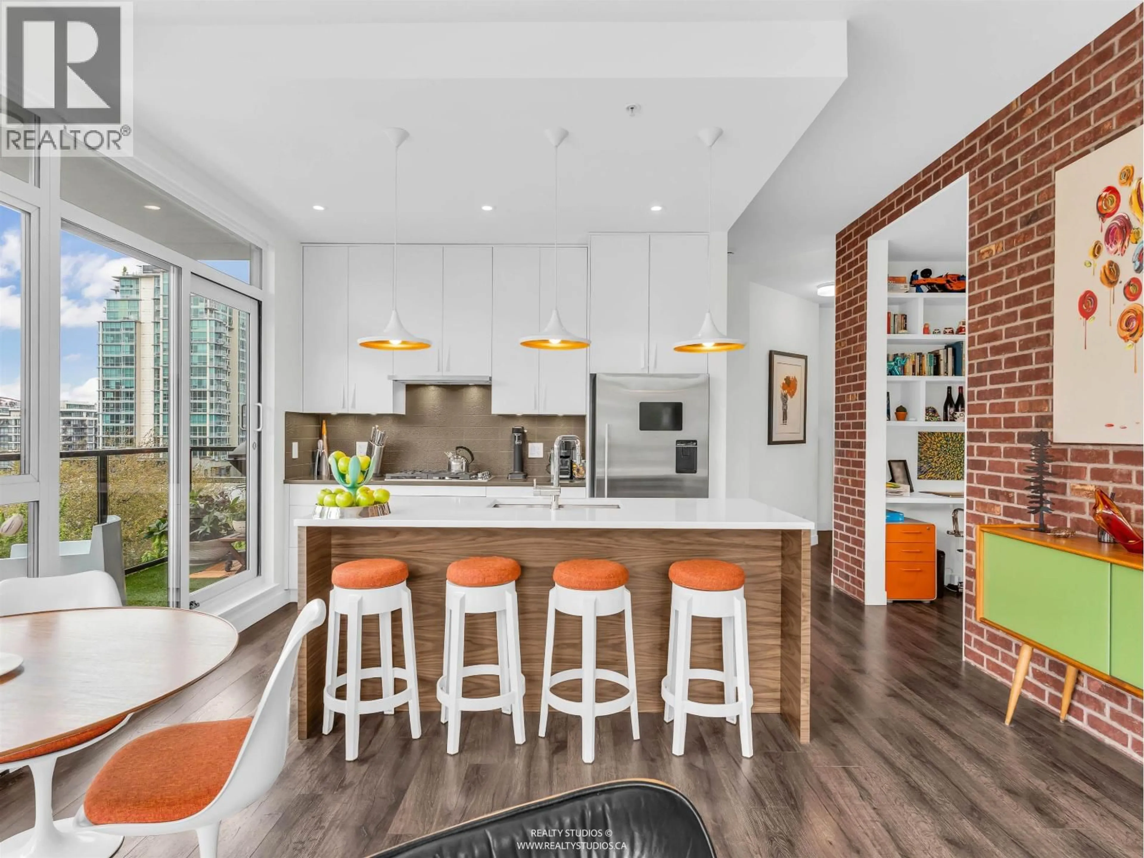 Open concept kitchen, ceramic/tile floor for 310 - 105 2ND STREET, North Vancouver British Columbia V7M0E3