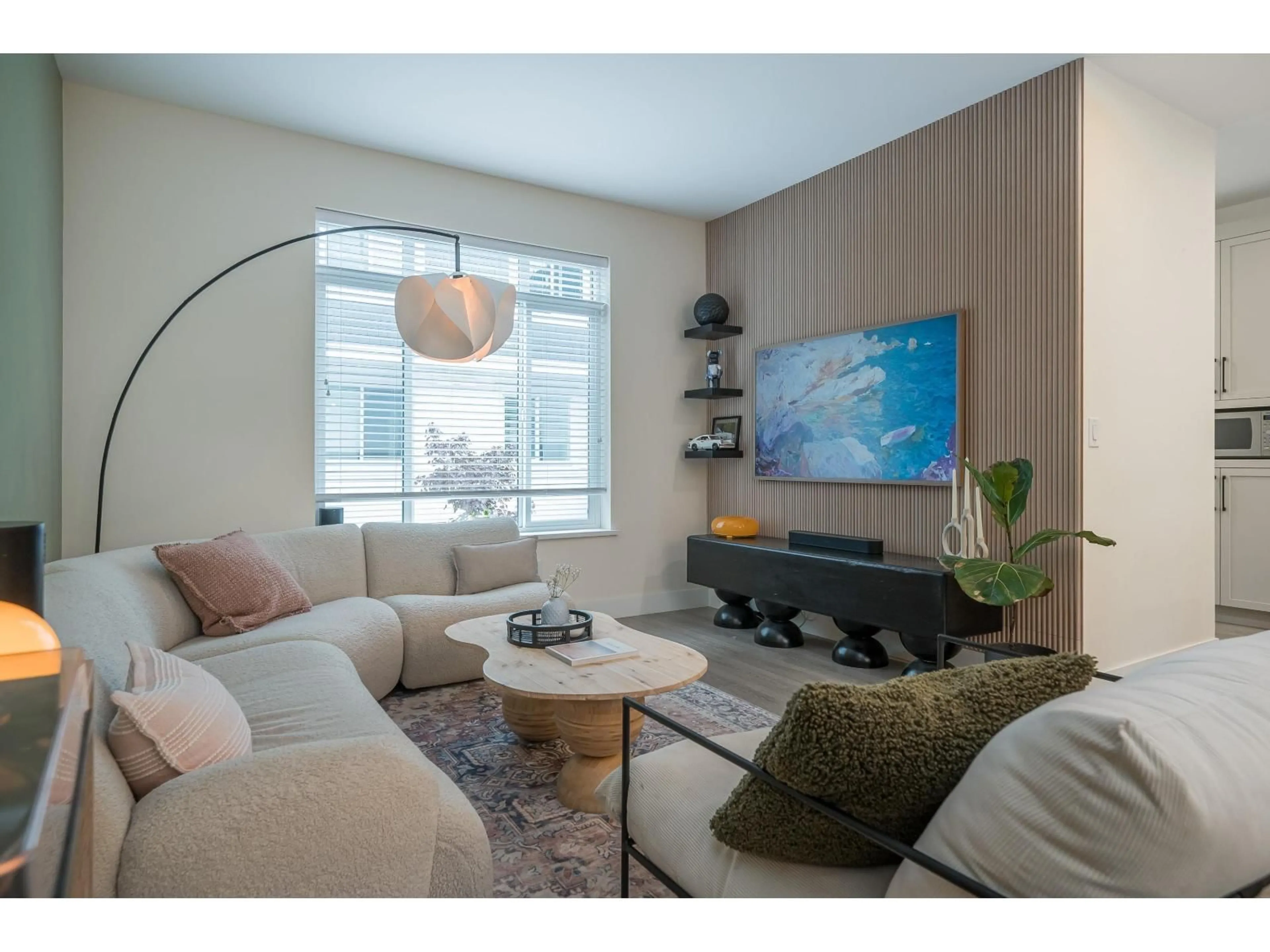 Living room with furniture, wood/laminate floor for 27 - 6897 201 STREET, Langley British Columbia V2Y0Z3