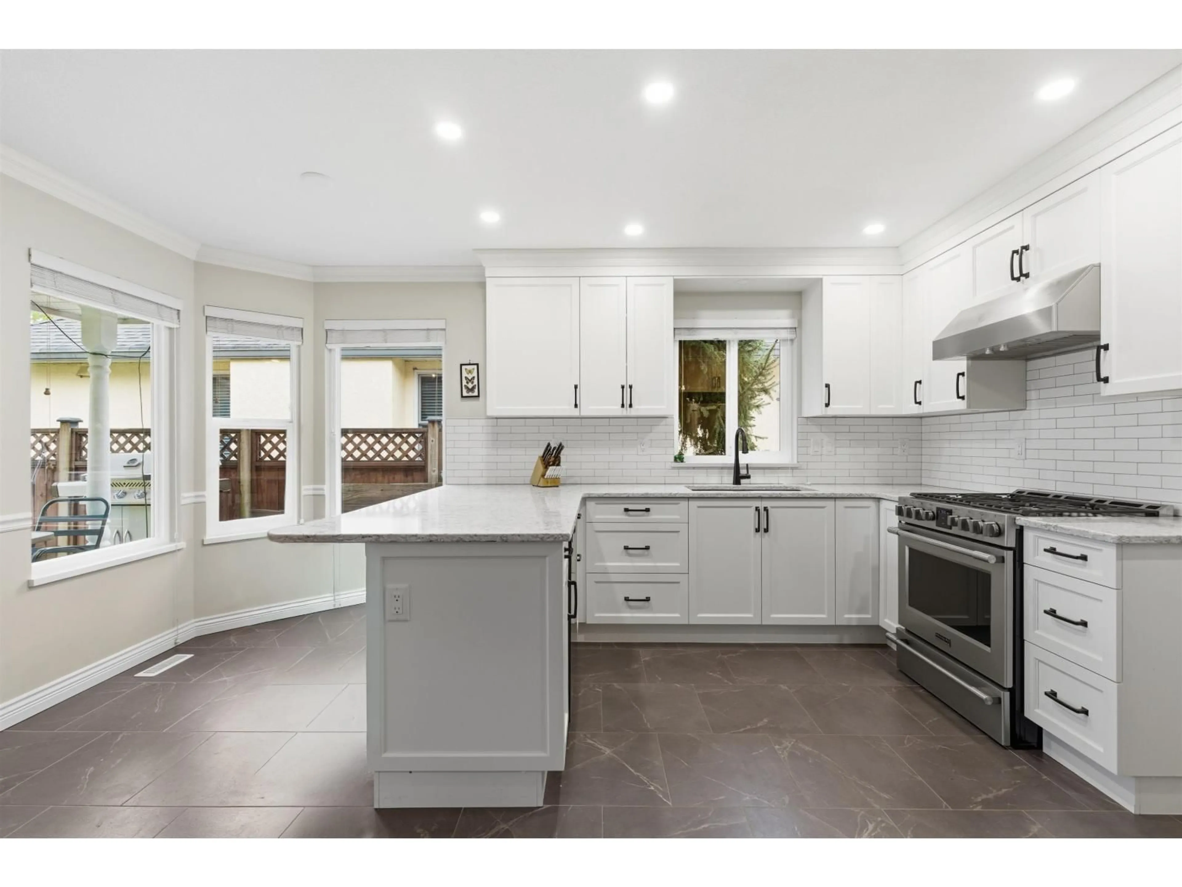 Open concept kitchen, ceramic/tile floor for 4912 208A STREET, Langley British Columbia V3A5T1