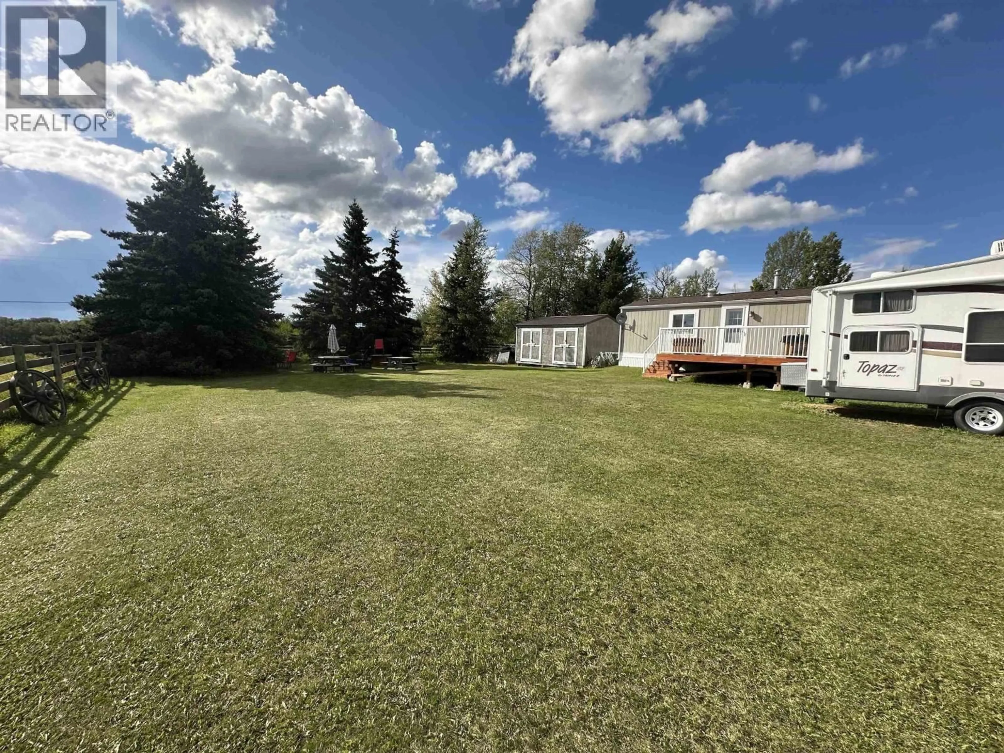 A pic from outside/outdoor area/front of a property/back of a property/a pic from drone, unknown for 8805 PINE ROAD, Fort St. John British Columbia V1J4M7